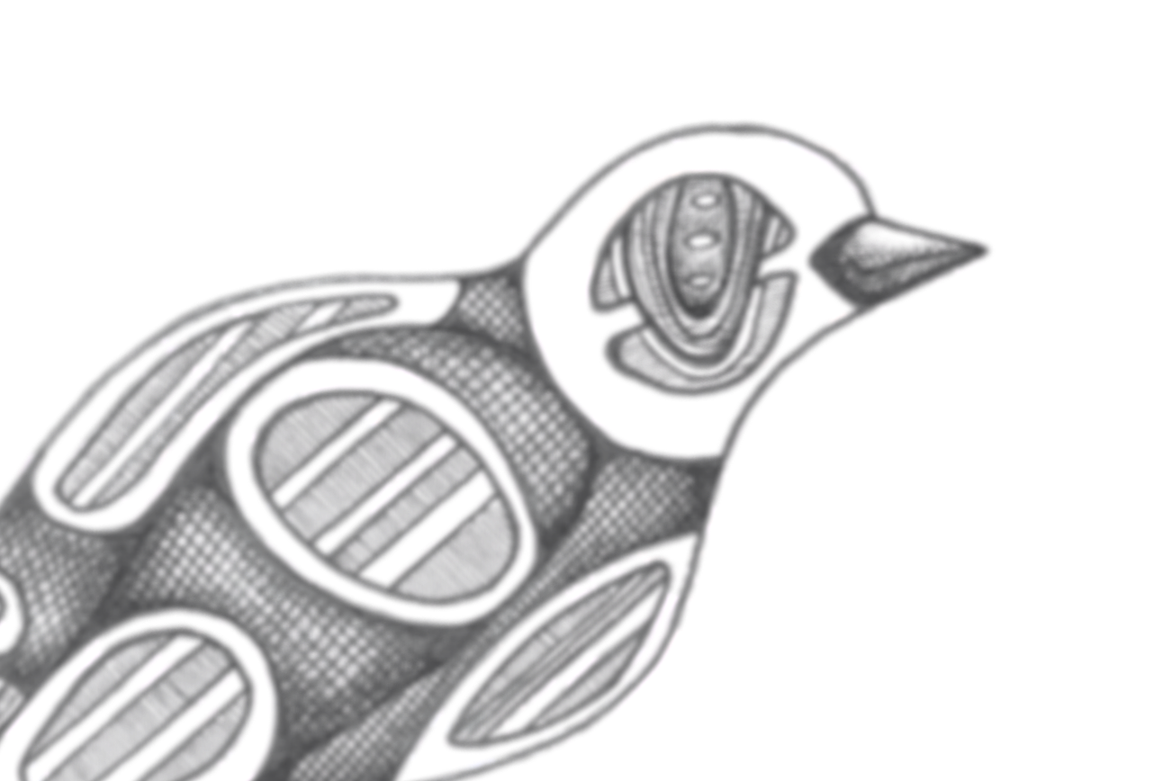 Close-up of a metallic decorative bird sculpture with intricate cut-out details.