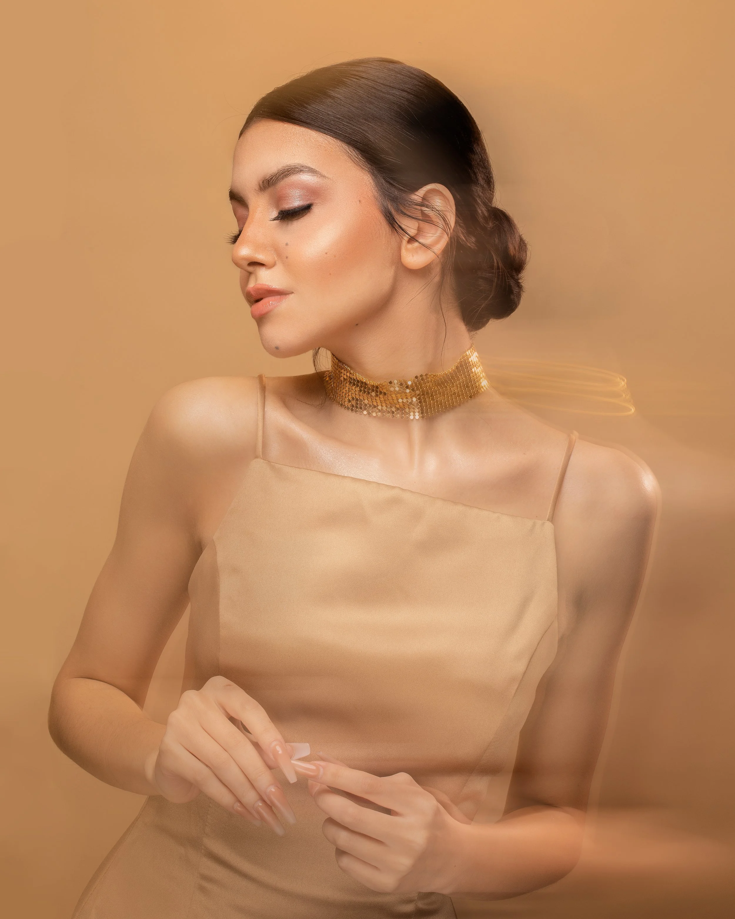 all gold hair and makeup photo shoot