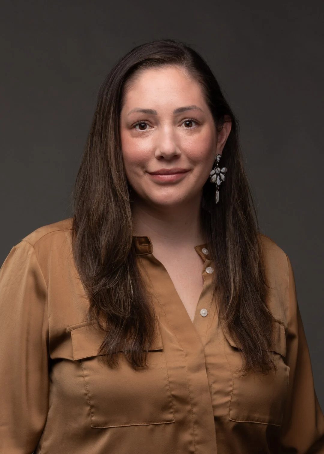 Portrait of Gabrielle Kelly LCSW who serves as the Board Chair for Sorrel Leaf Healing Center