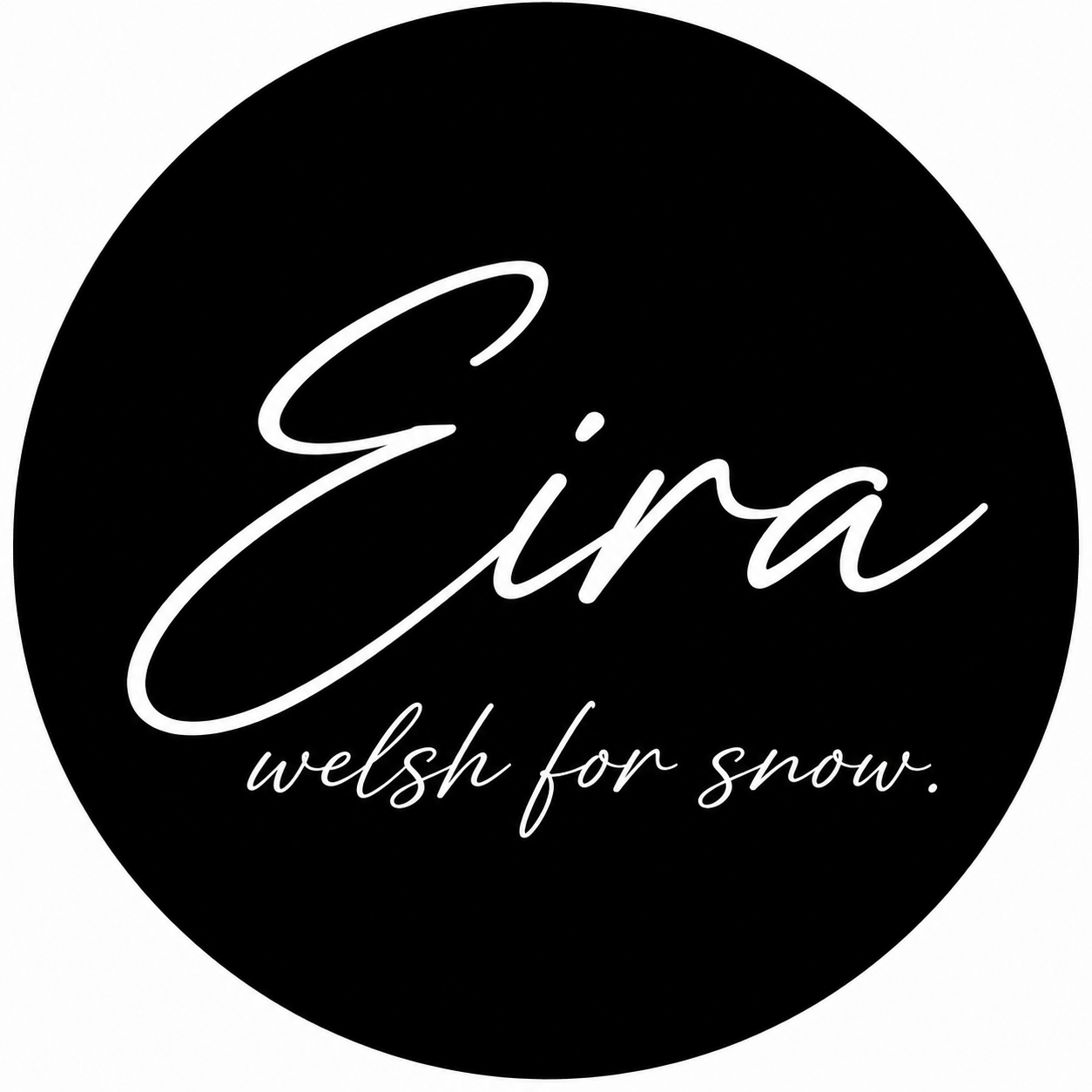 Black circle with white cursive text that reads 'Eira' and smaller cursive text underneath that reads 'welsh for snow'.