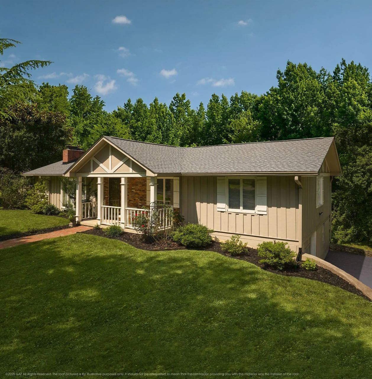 A single-story house with new roof and siding by National Roofing St. Louis after storm damage, roof inspection and roof repairs with a small front porch, surrounded by green lawn and shrubbery, with a wooded background and a partly cloudy sky.