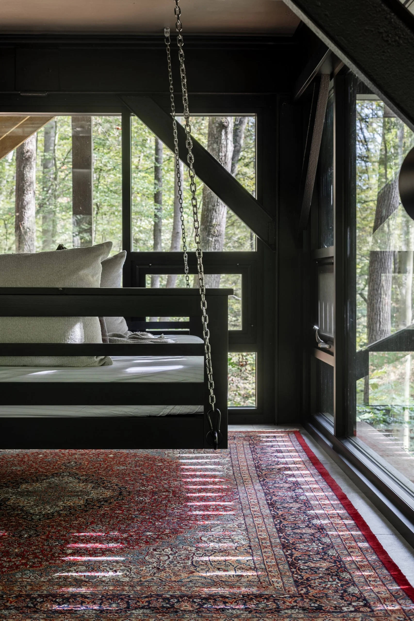 Transformed basement remodel for modern living by S. Flynn Home featuring a floating bed installation