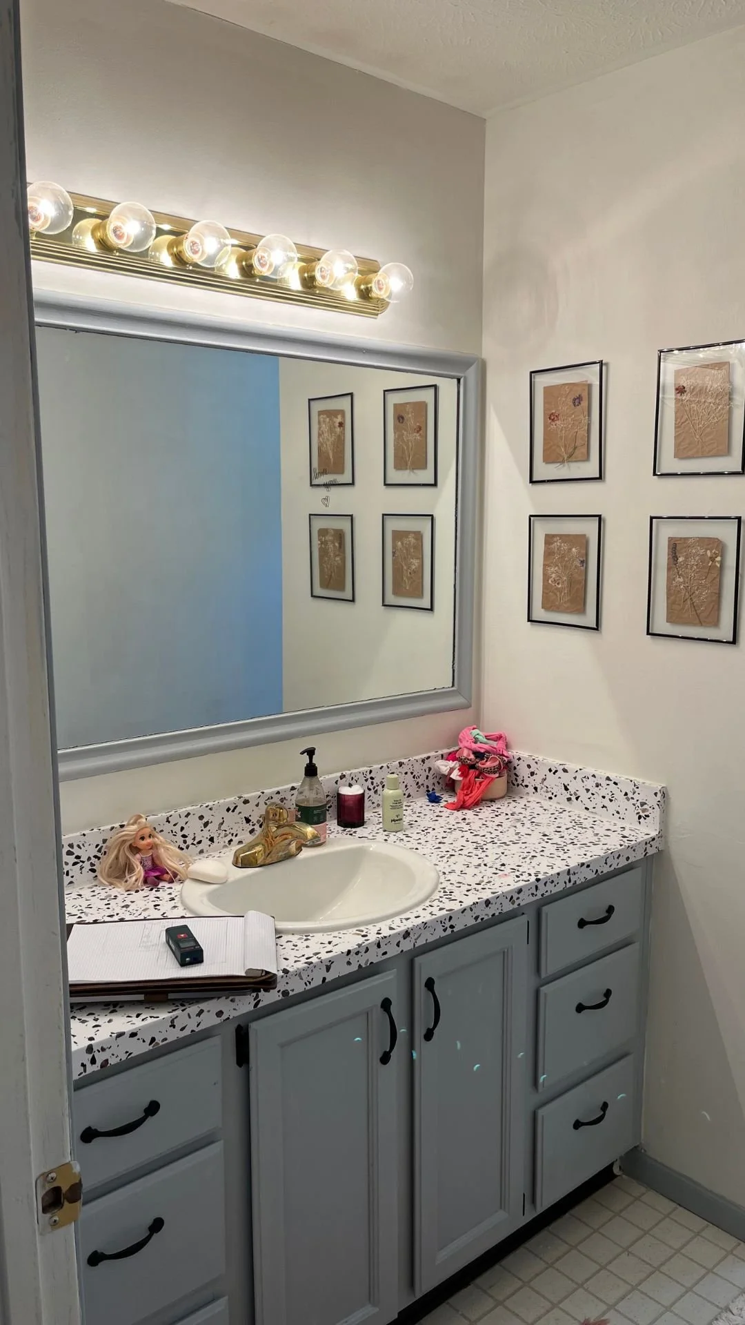 Photo of bathroom sink before S. Flynn Design + Build remodel