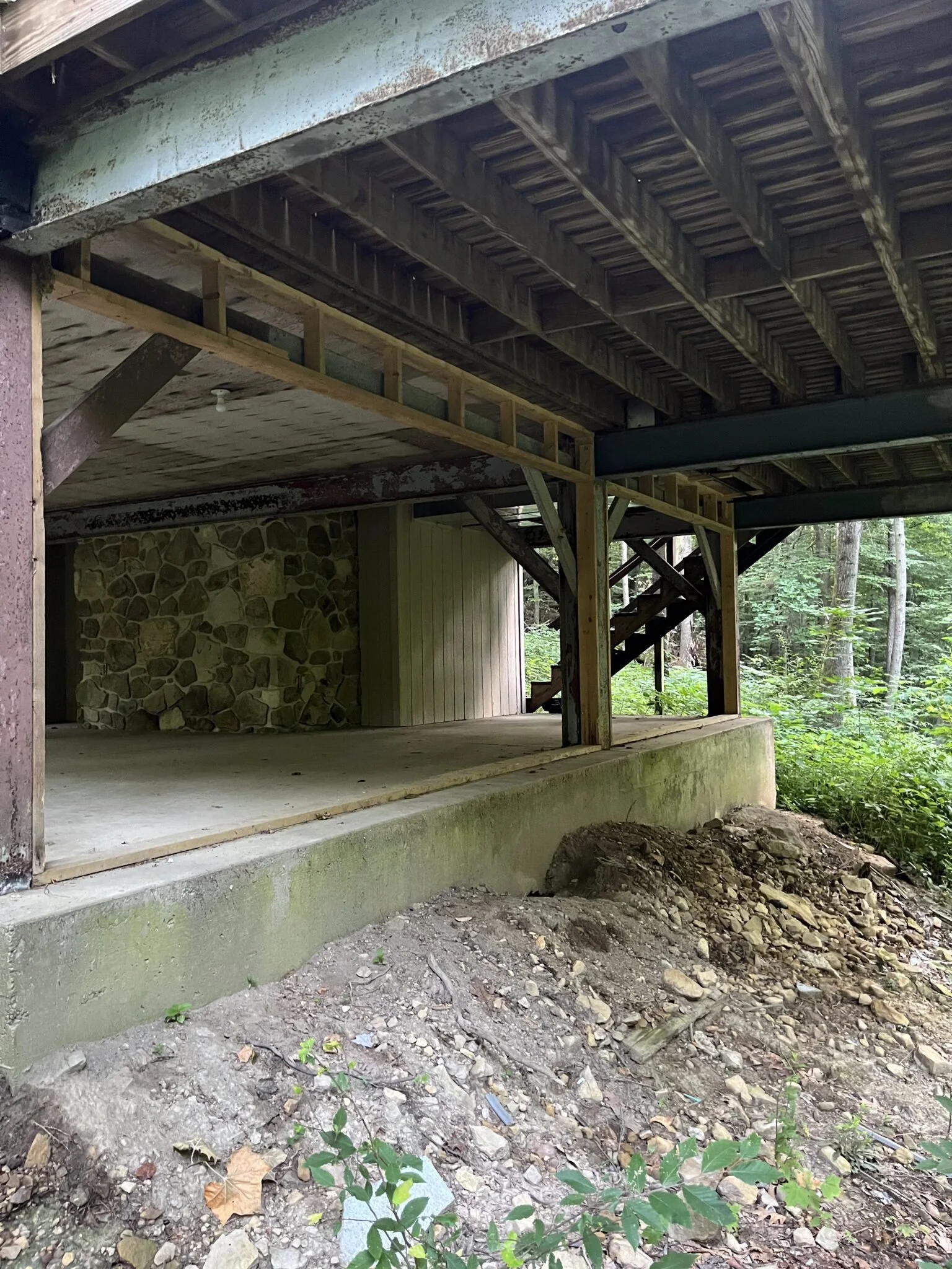Concrete slab basement photo before S. Flynn Home remodeled it into a cozy, livable space