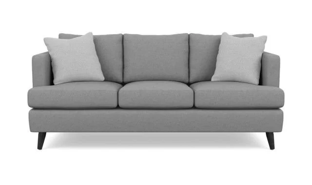 Gray upholstered sofa with three seat cushions, three back cushions, and two throw pillows on a white background.