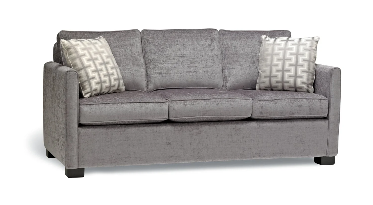 Gray upholstered sofa with two patterned throw pillows.