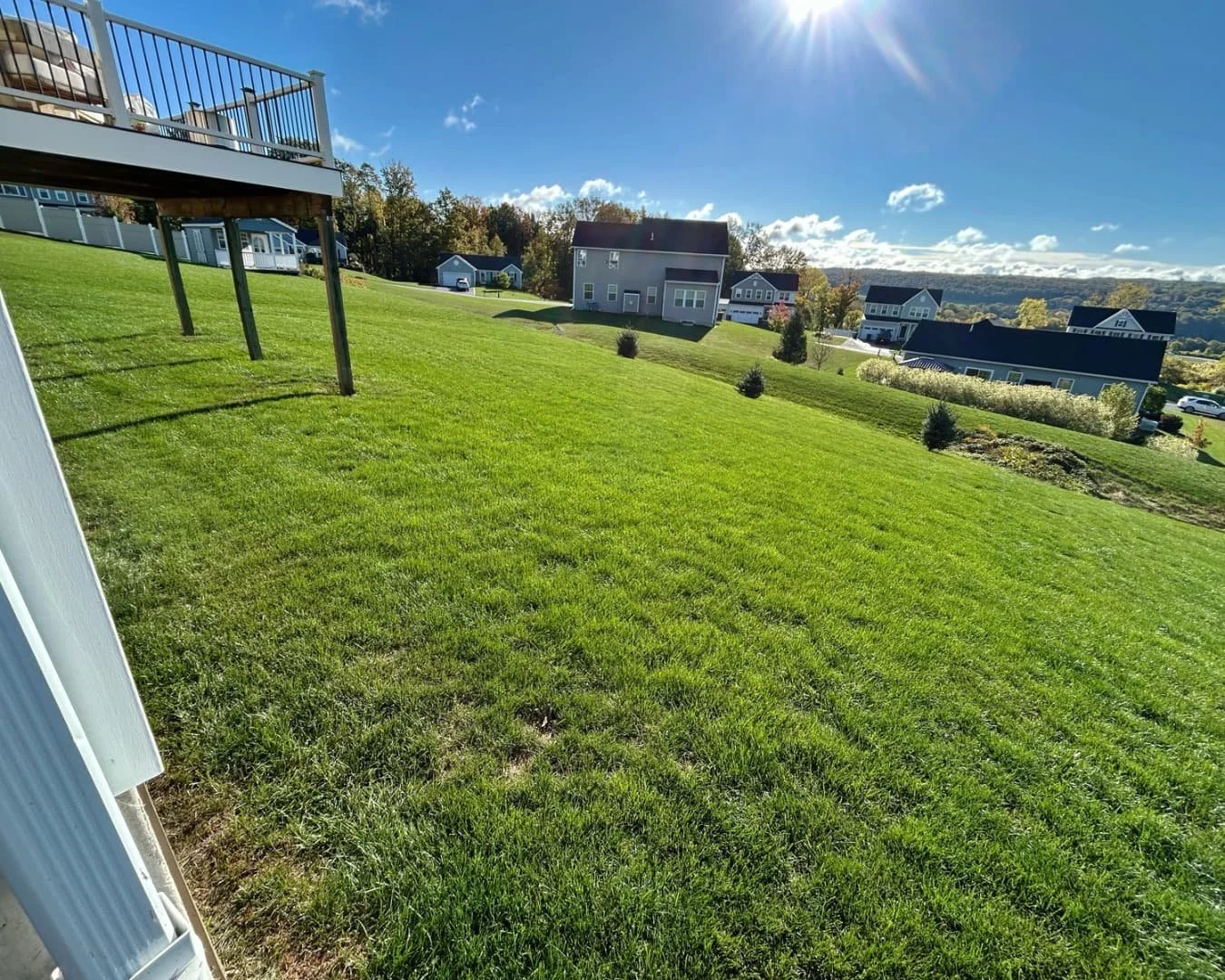 Backyard lawn before construction by Pines and Pavers in Lysander, New York.