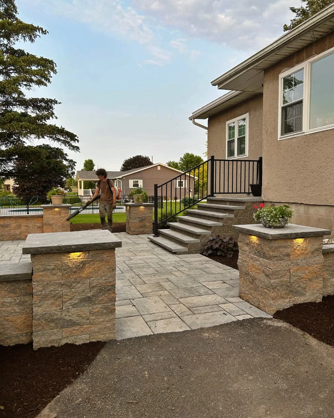 Stepping stone path and mulch bed completed by Pines and Pavers in Fayetteville, New York.