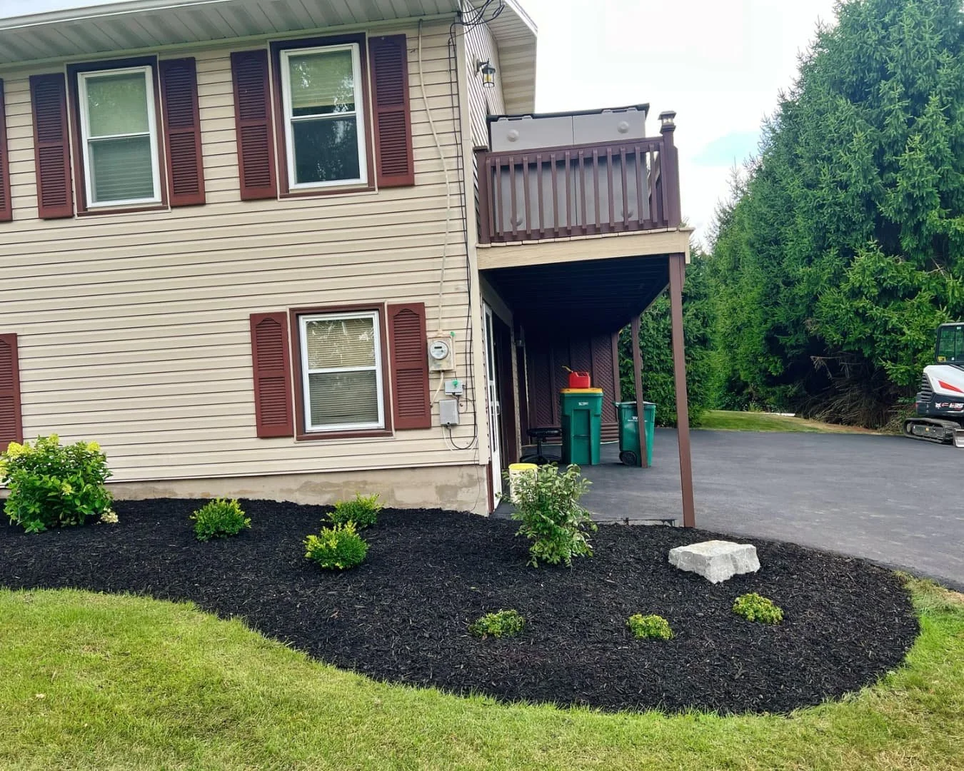 entry walkway and foundation landscaping completed by Pines and Pavers in Upstate New York.