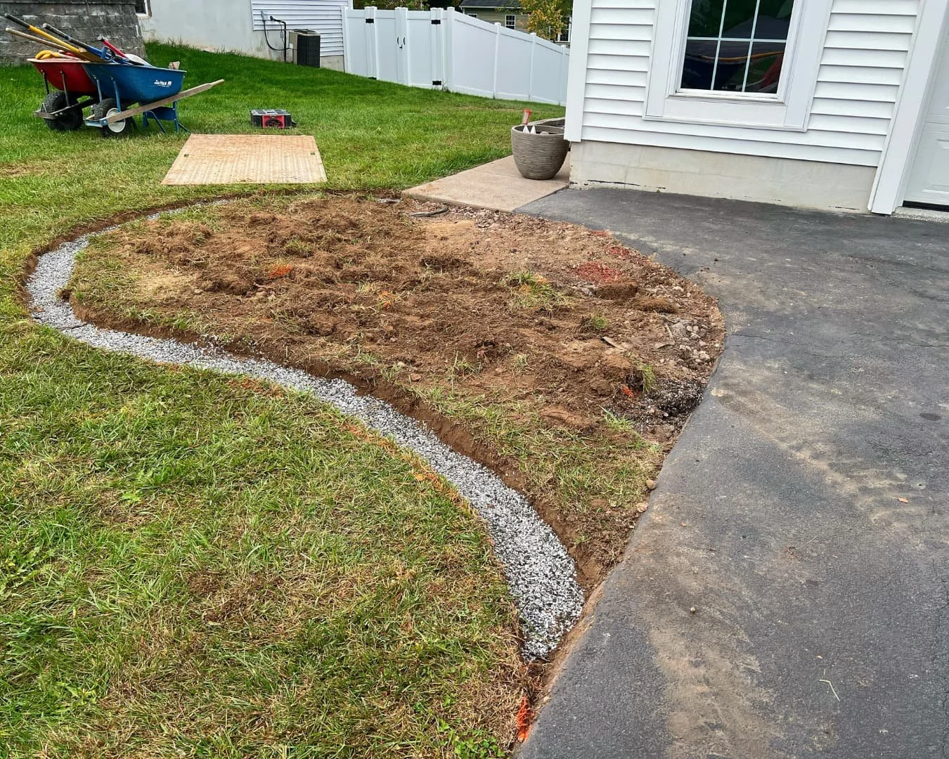 Front yard excavation before installation by Pines and Pavers in Lysander, New York.