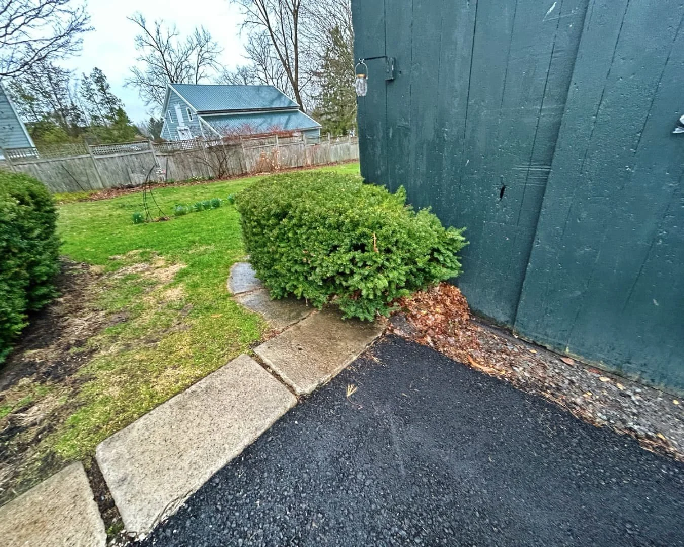 Walkway area before project installation by Pines and Pavers in Cazenovia, New York.