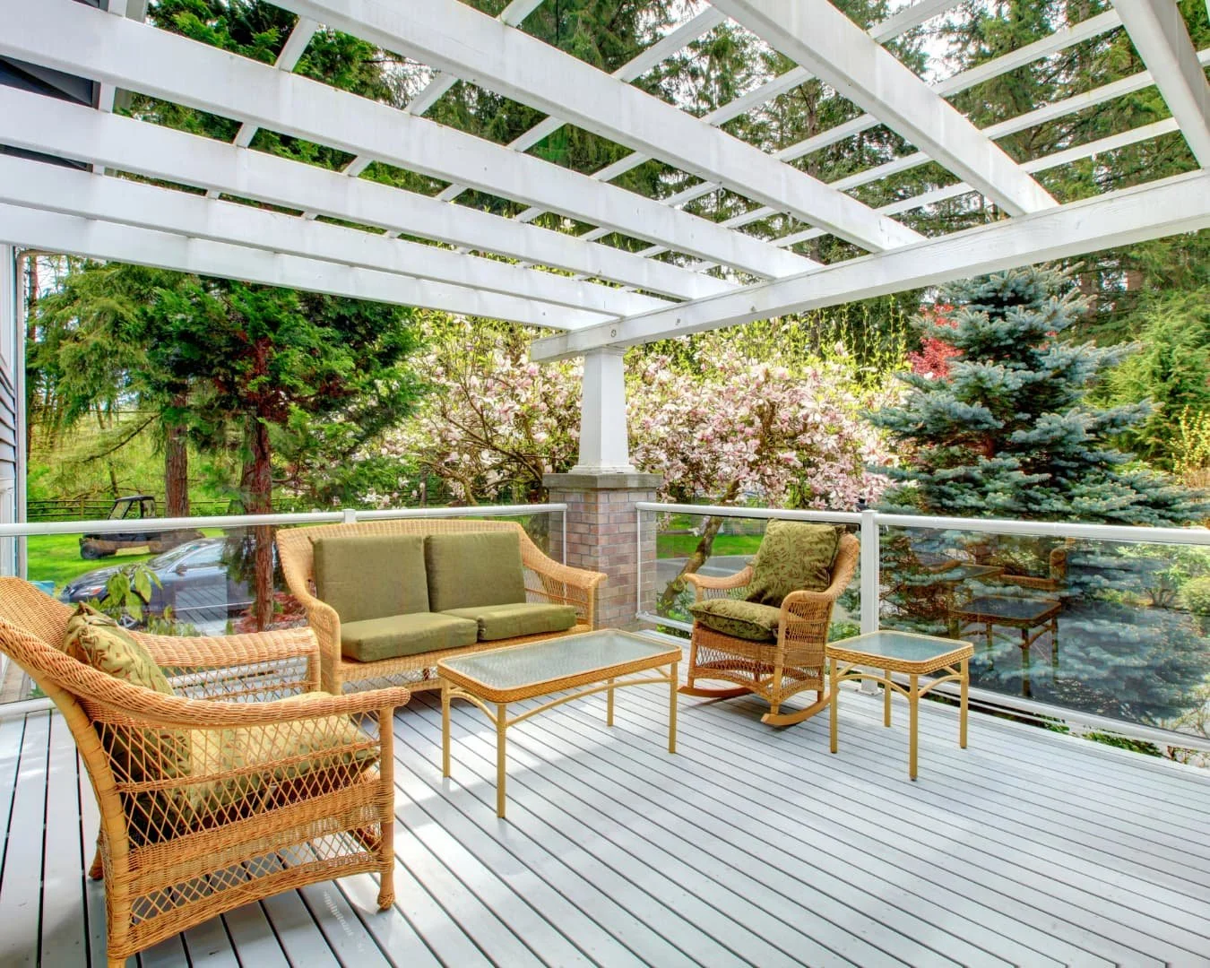Deck inspiration with a covered pergola-style structure and relaxed outdoor lounge seating.