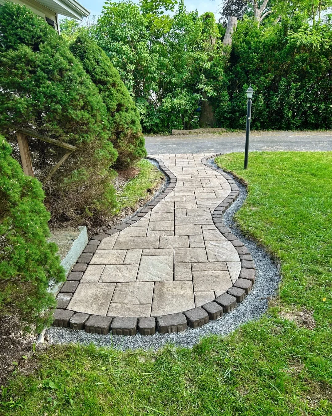 Front entry area before walkway installation by Pines and Pavers in Central New York.