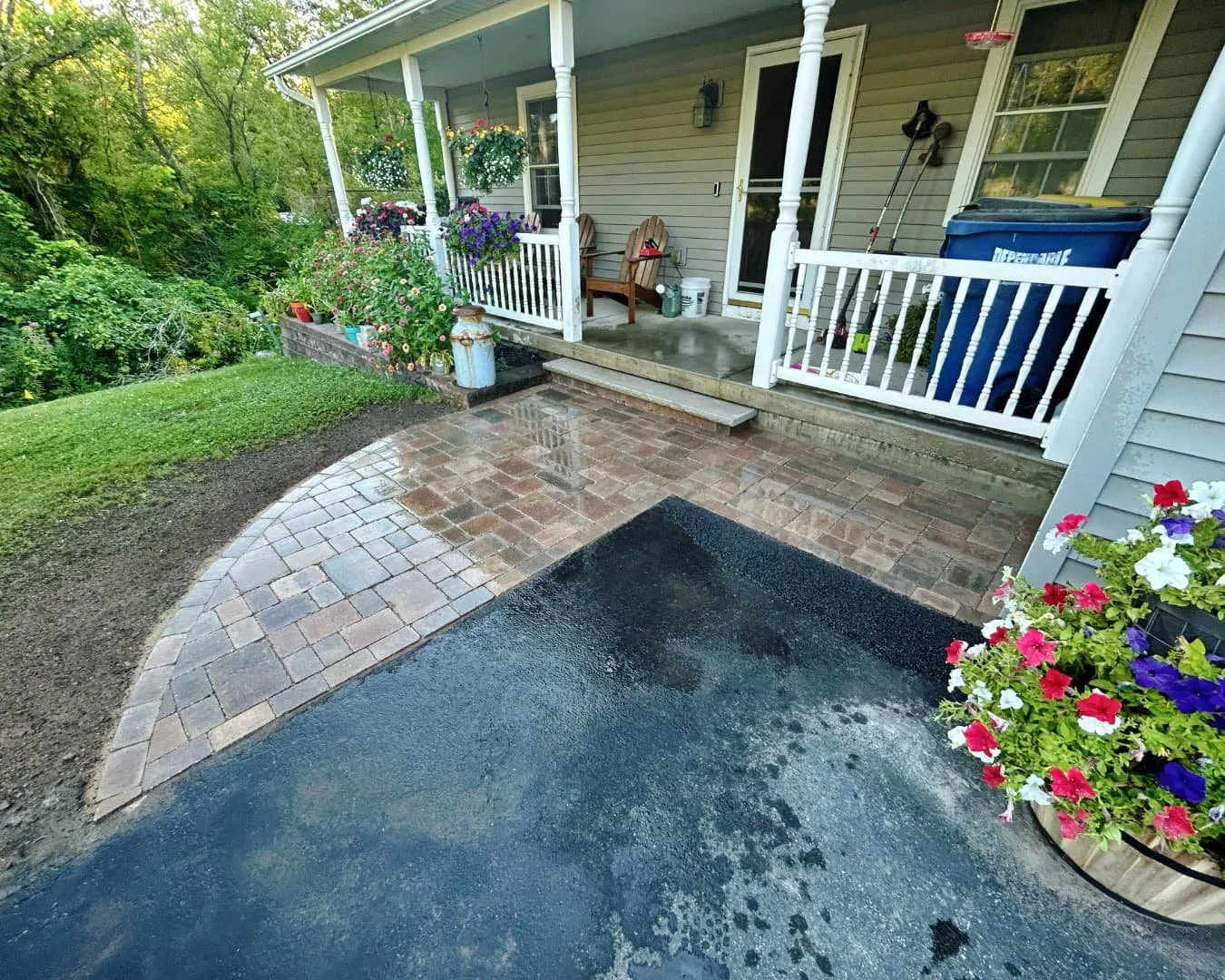 Curved paver entry patio completed by Pines and Pavers in Camillus, New York.