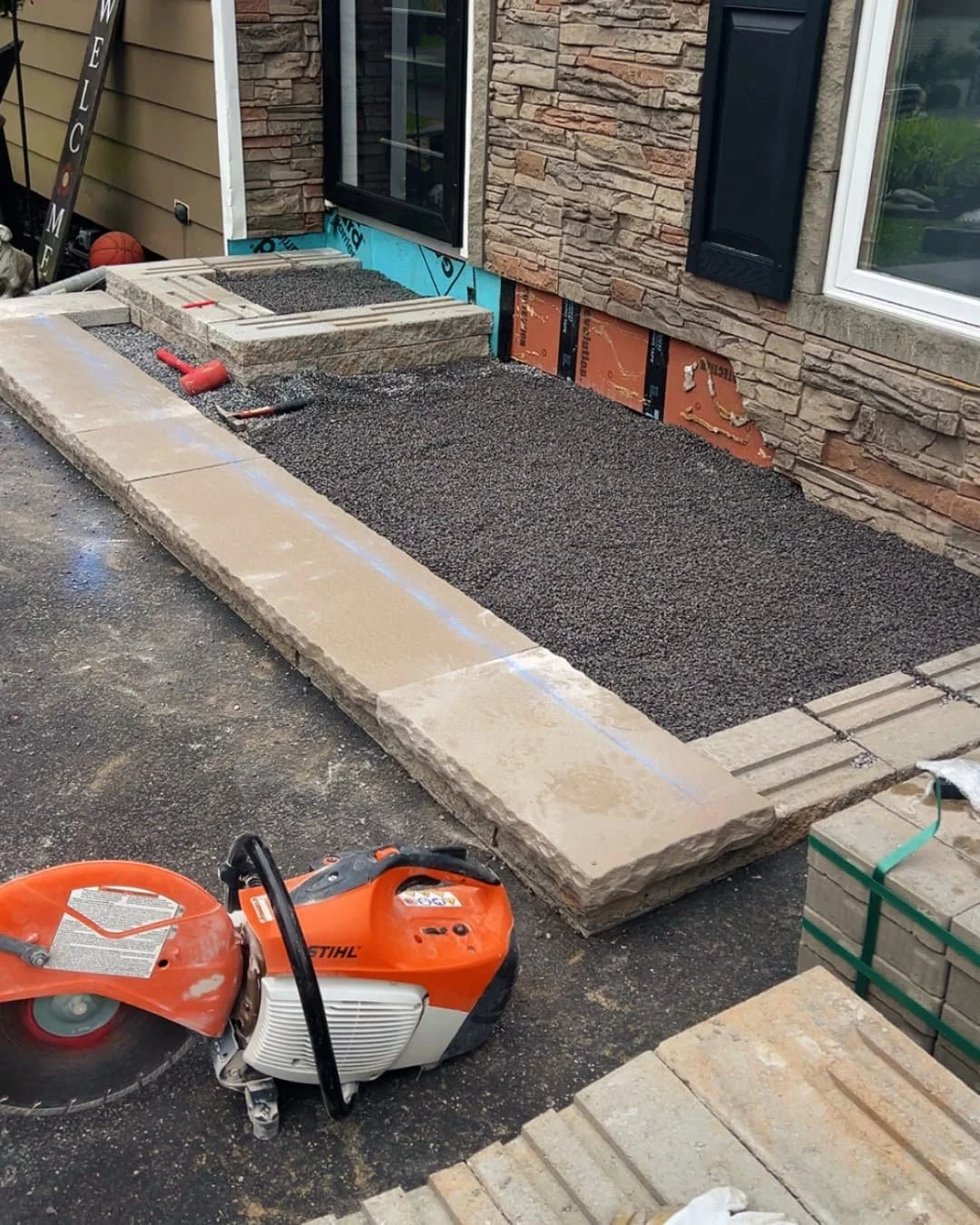 Entry patio installation in progress by Pines and Pavers in Camillus, New York.