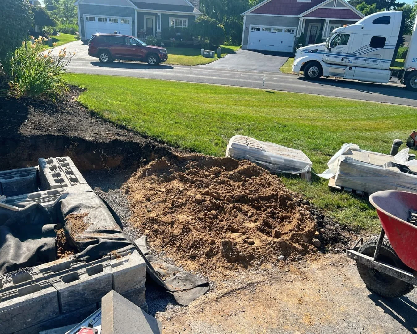 Entry area demolition and excavation by Pines and Pavers in Manlius, New York.