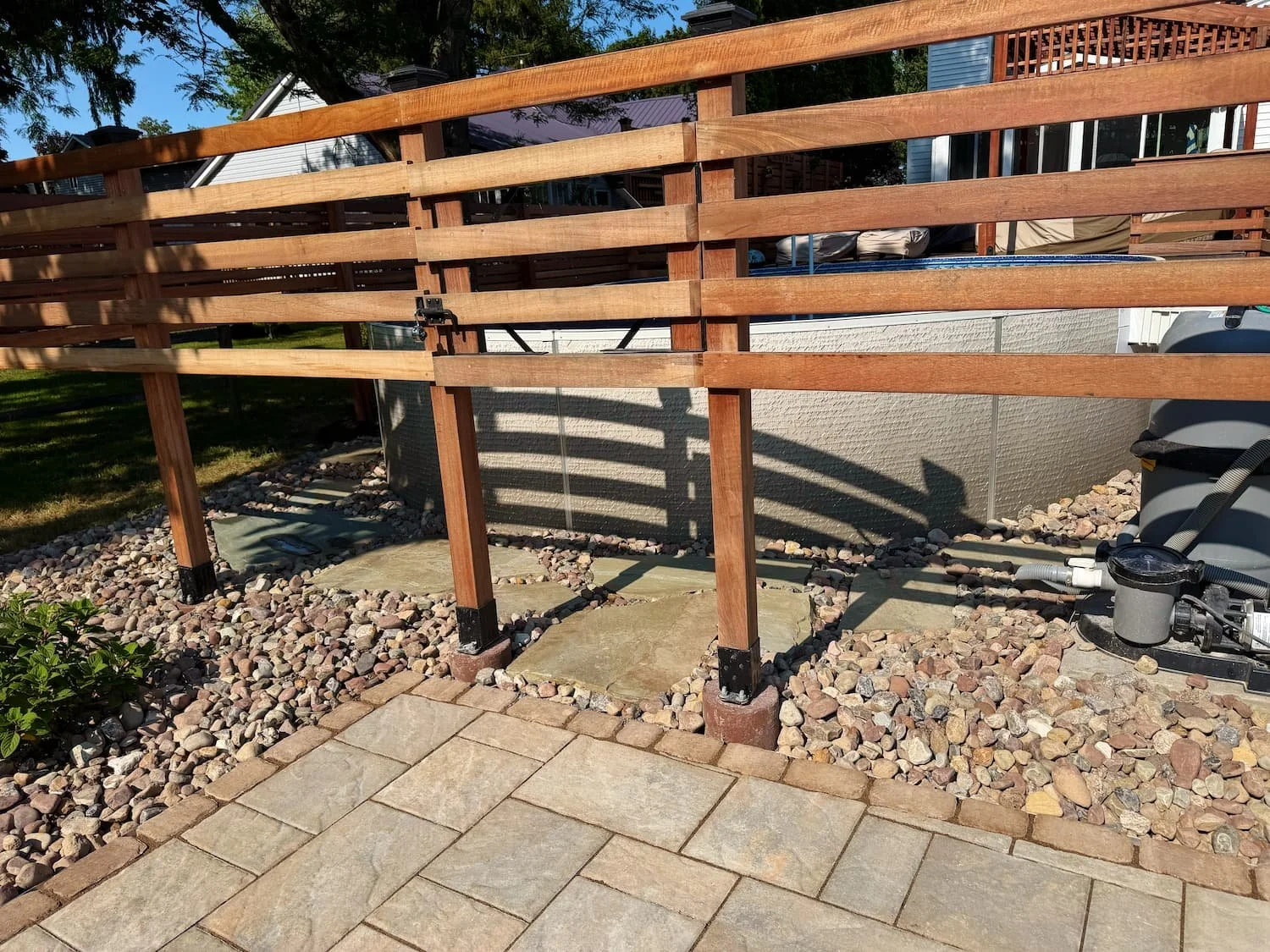 Finished mulch planting bed with shrubs and perennials as part of a Central New York landscape renovation.
