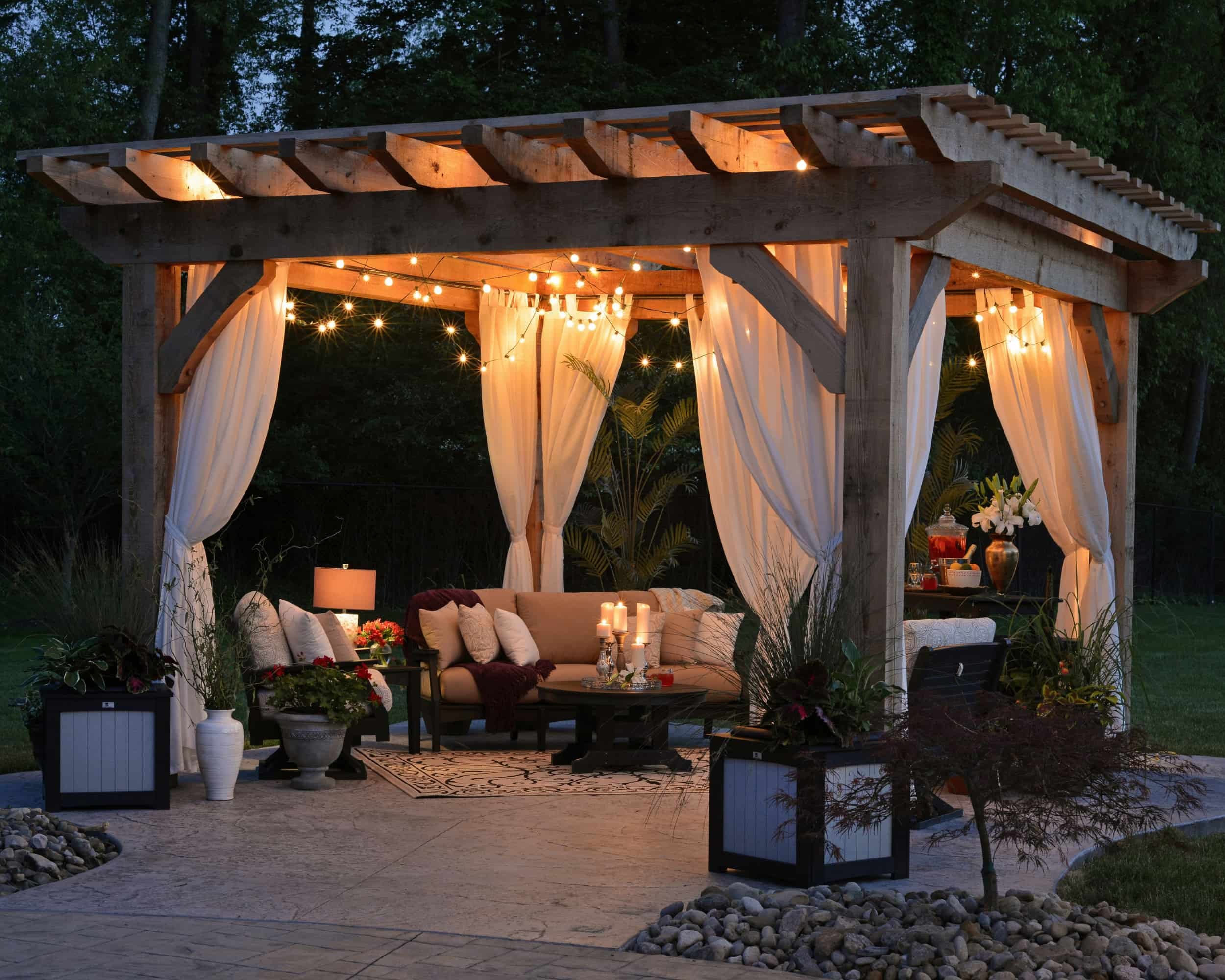 Backyard pergola installation designed for evening outdoor living