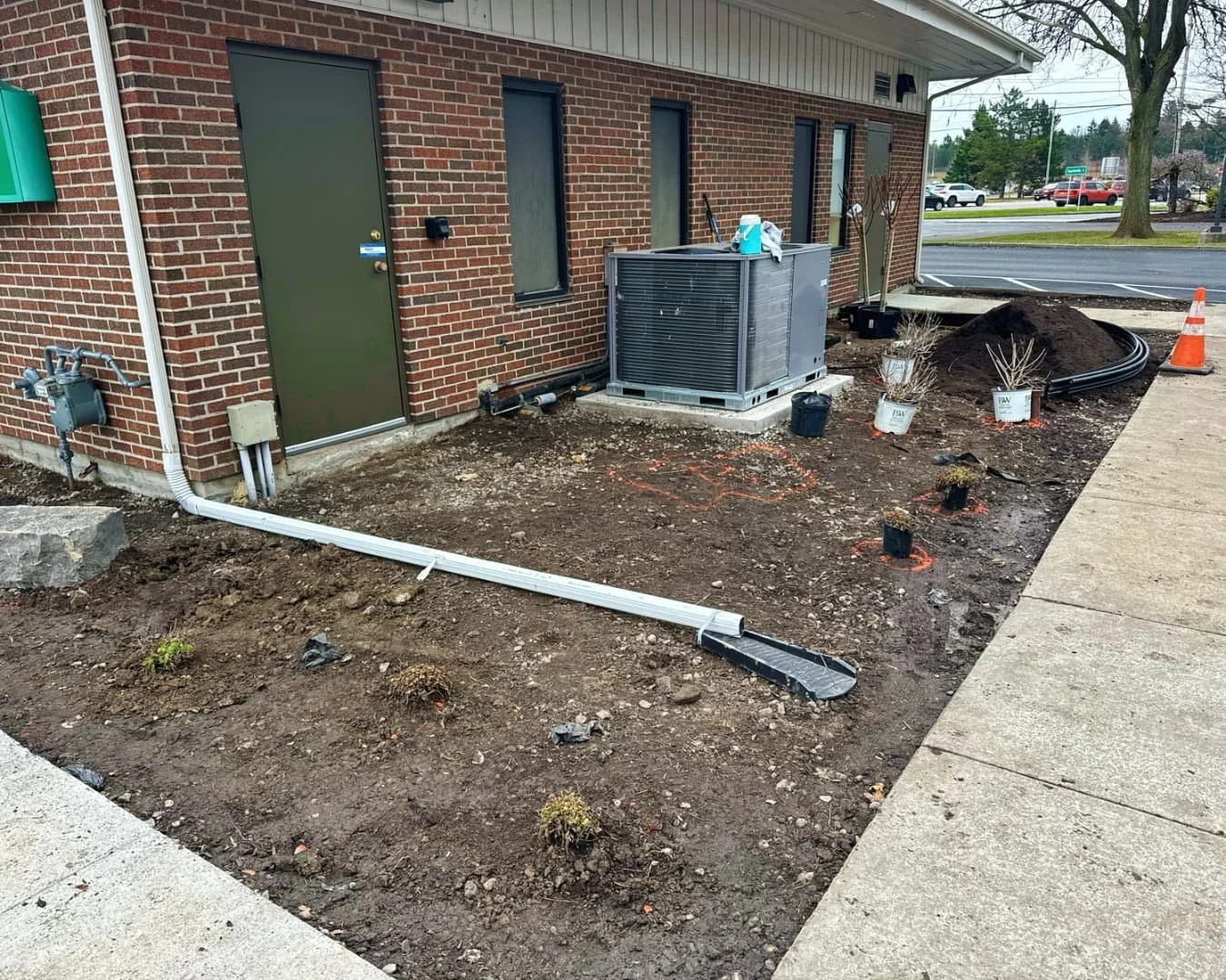 Foundation landscape bed at Citizens Bank completed by Pines and Pavers in Cicero, New York.