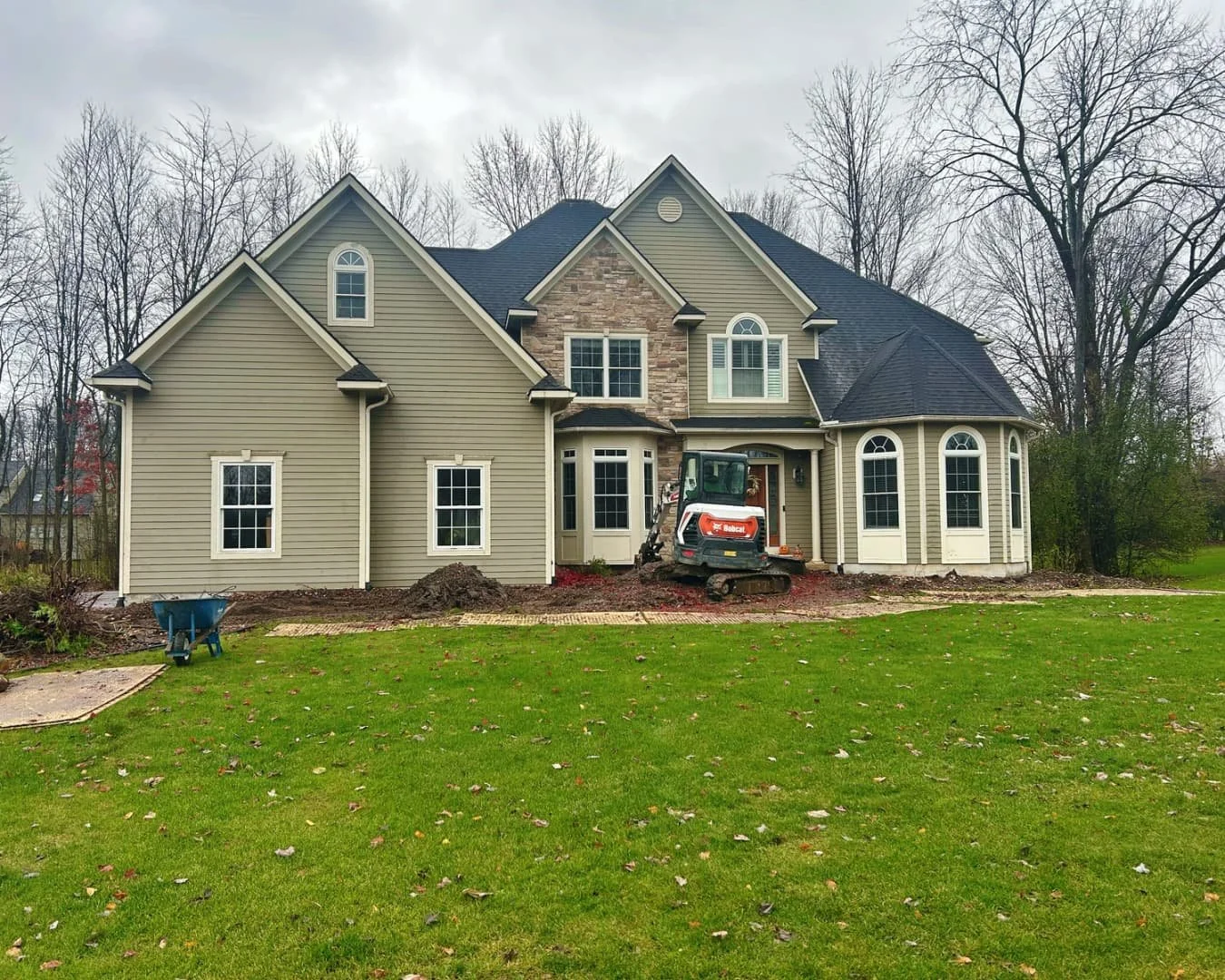 Front walkway base installation in progress by Pines and Pavers in Fayetteville, New York.