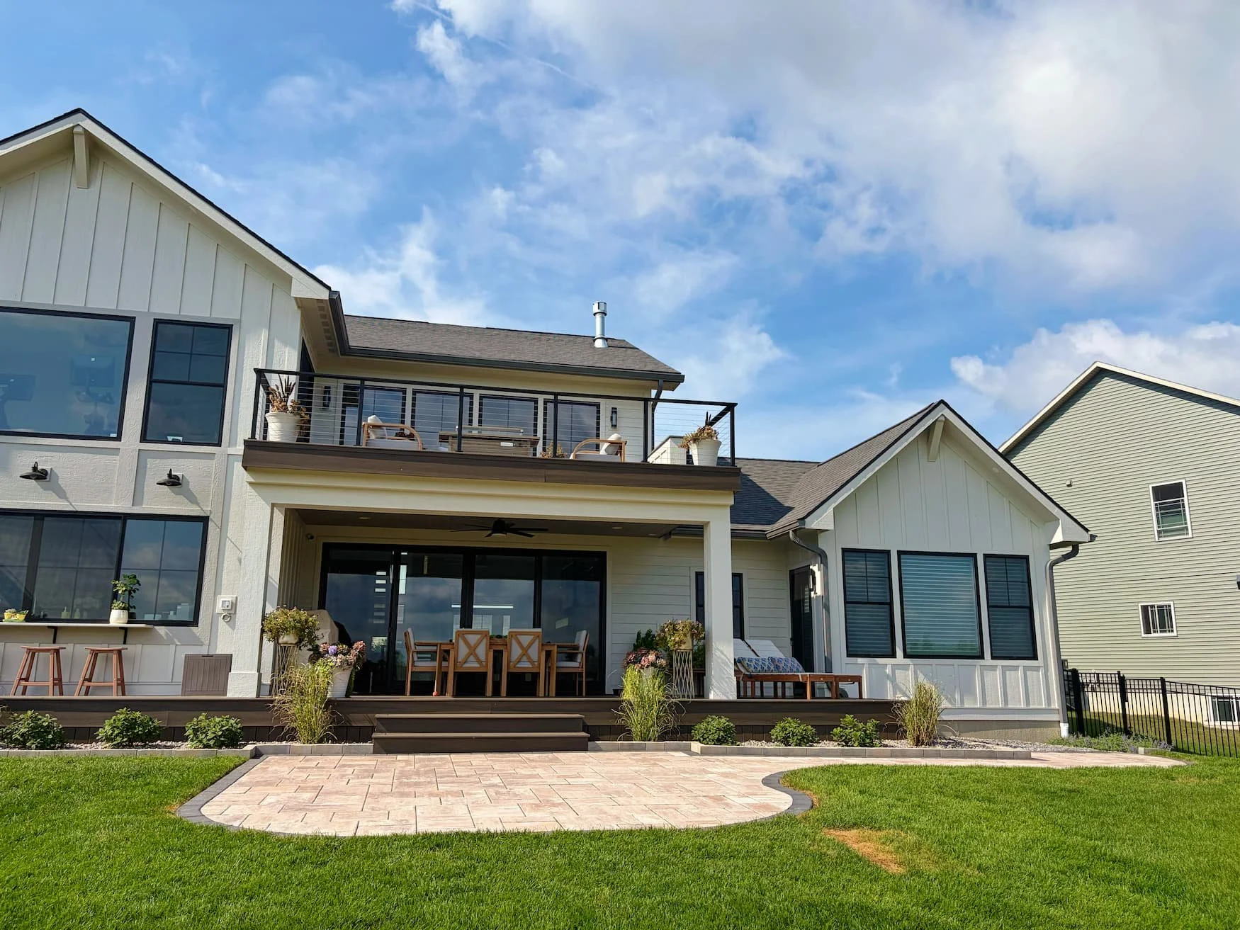 Green lawn and completed landscape installation at a Central New York property