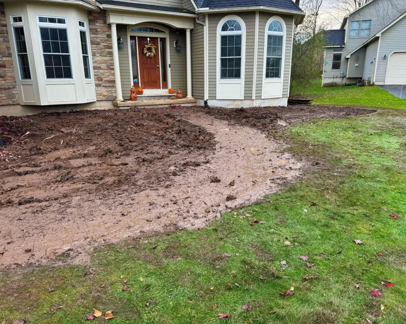 Excavation and site work by the front entry by Pines and Pavers in Fayetteville, New York.