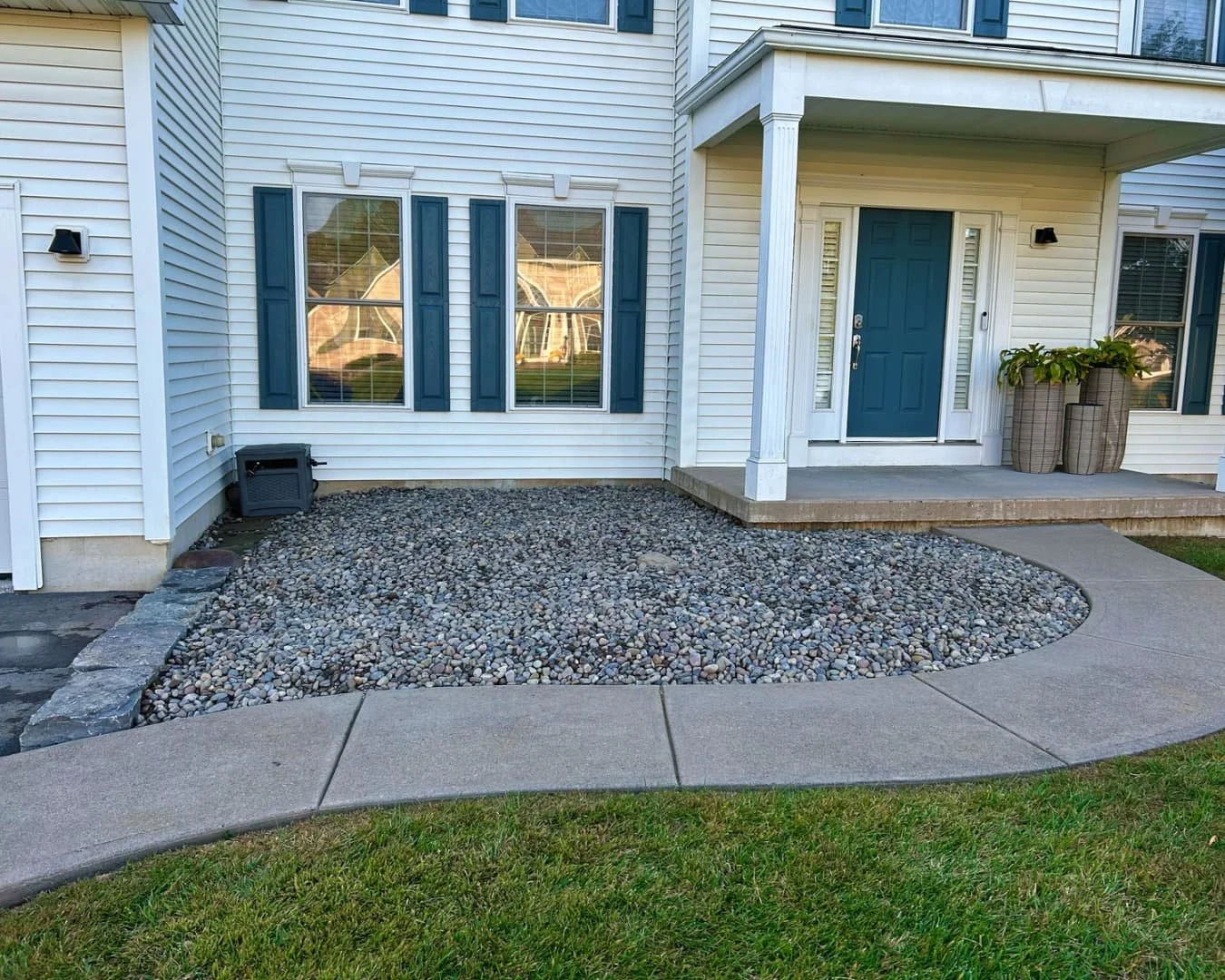 Front yard landscape overview with Japanese maple completed by Pines and Pavers in Lysander, New York.