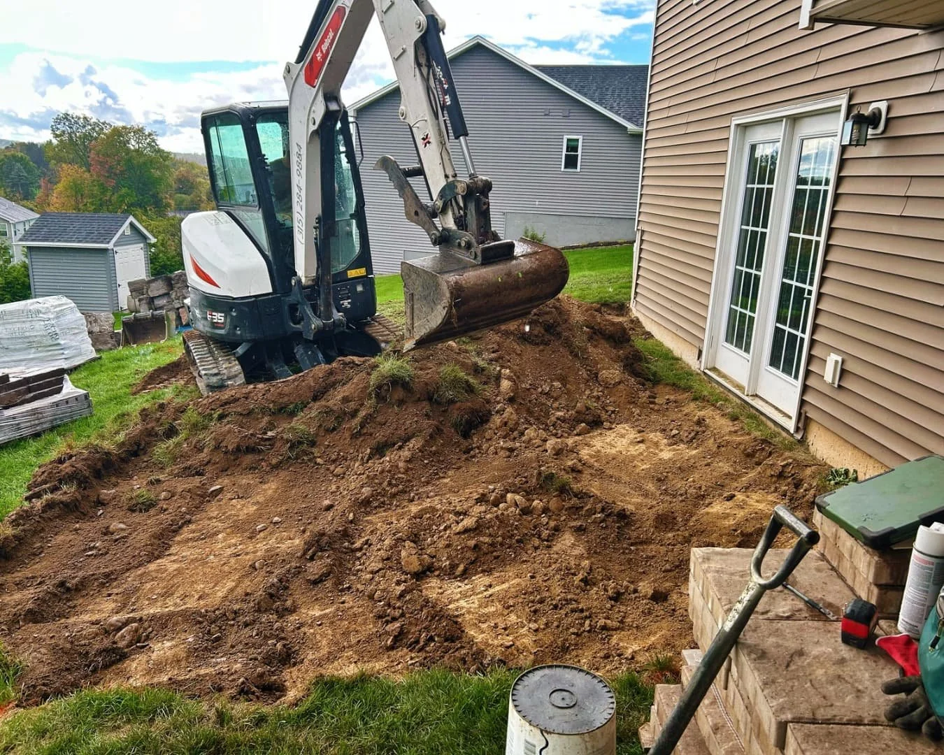 Excavation and grade preparation by Pines and Pavers in Lysander, New York.