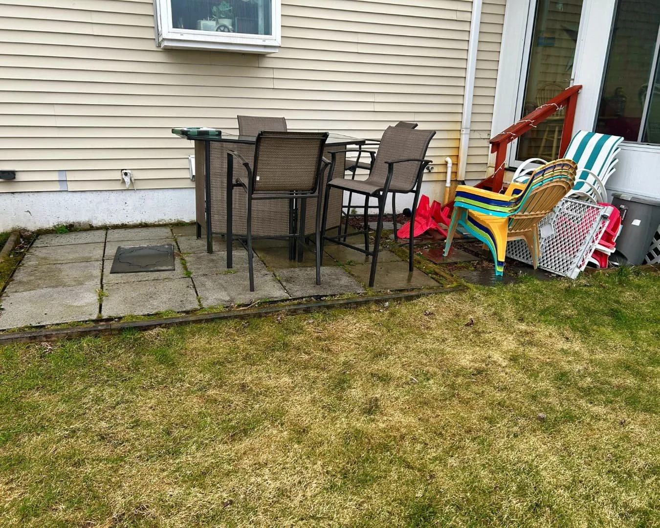 Rear yard before hardscape installation by Pines and Pavers in Marcellus, New York.