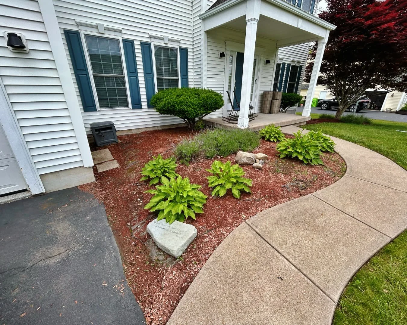 Front bed removal and site preparation by Pines and Pavers in Lysander, New York.