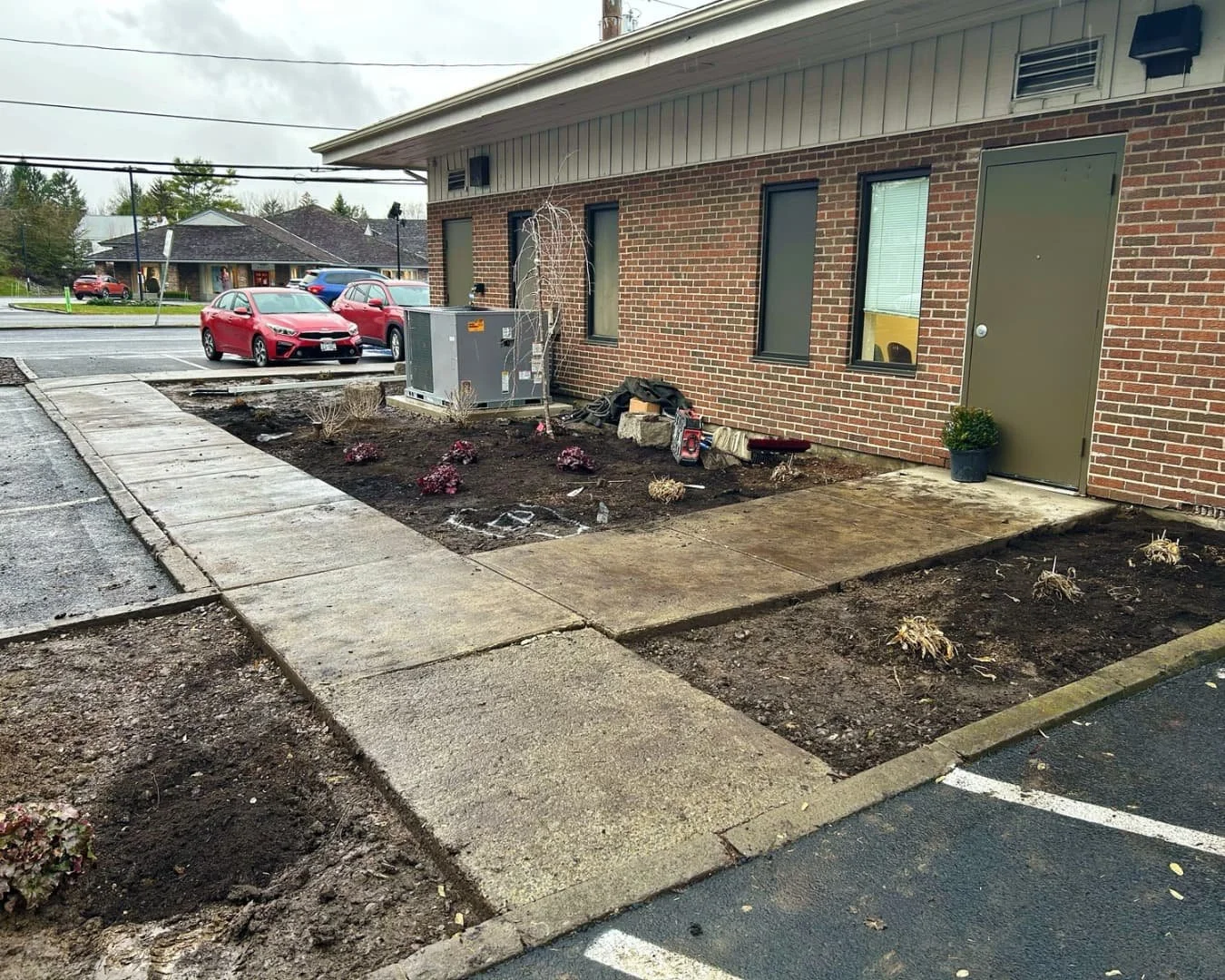 Foundation landscape bed at Citizens Bank completed by Pines and Pavers in Cicero, New York.