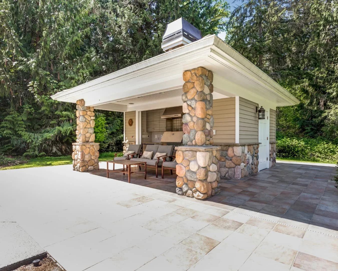 Outdoor kitchen inspiration with a covered pavilion structure and open-air cooking space.