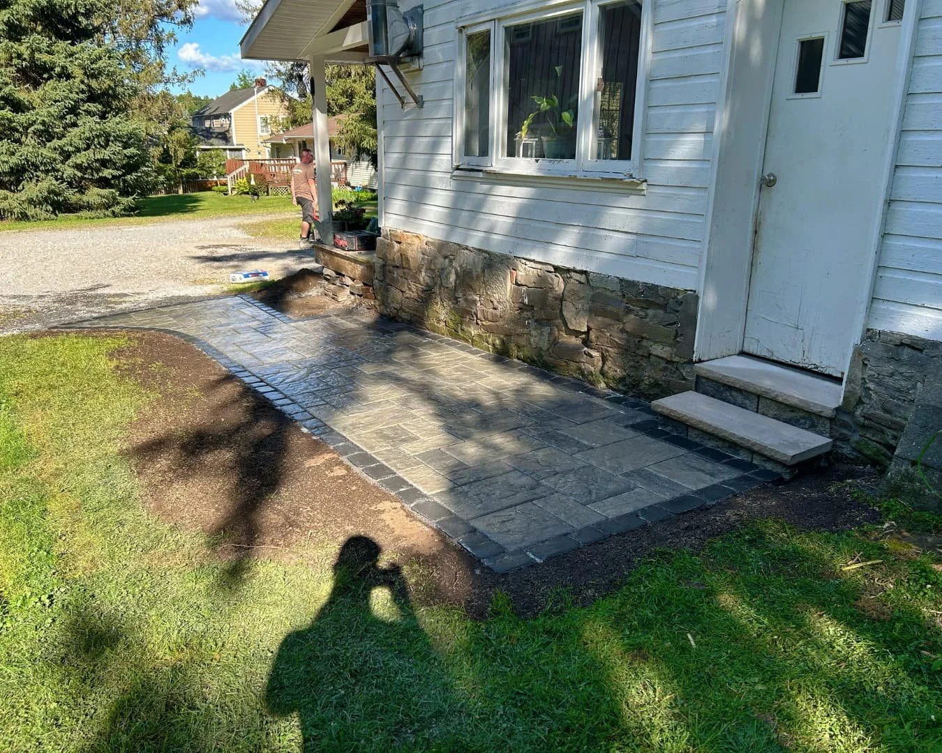 2. Front step and paver patio completed by Pines and Pavers in Cicero, New York.