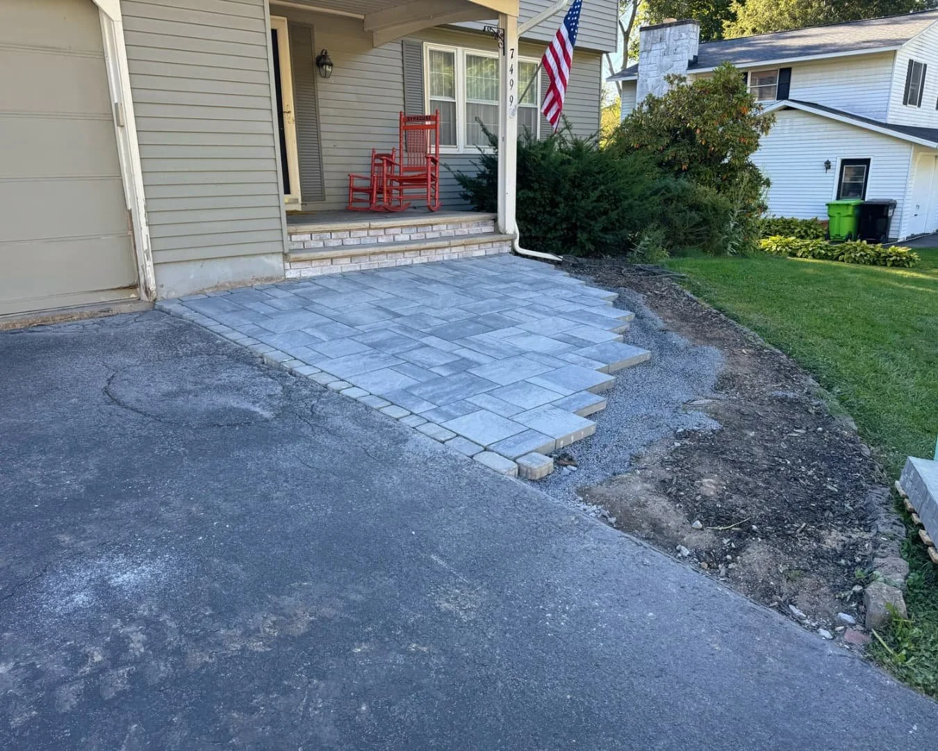 Front entry paver steps in progress by Pines and Pavers in Skaneateles, New York.