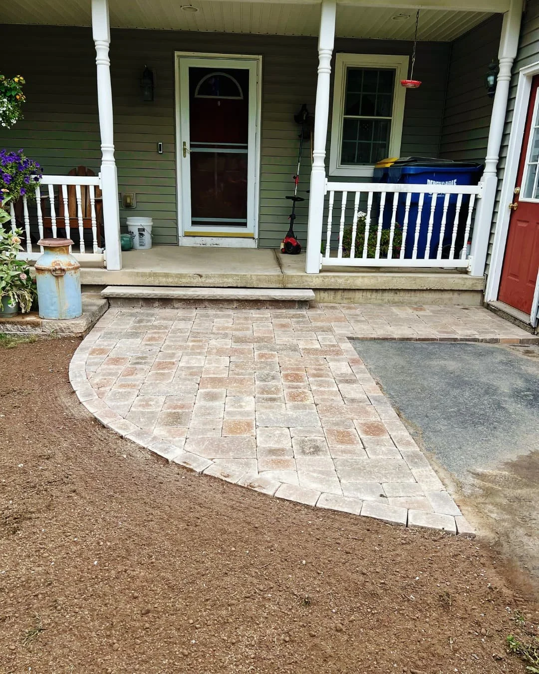Front porch patio and walkway completed by Pines and Pavers in Camillus, New York.