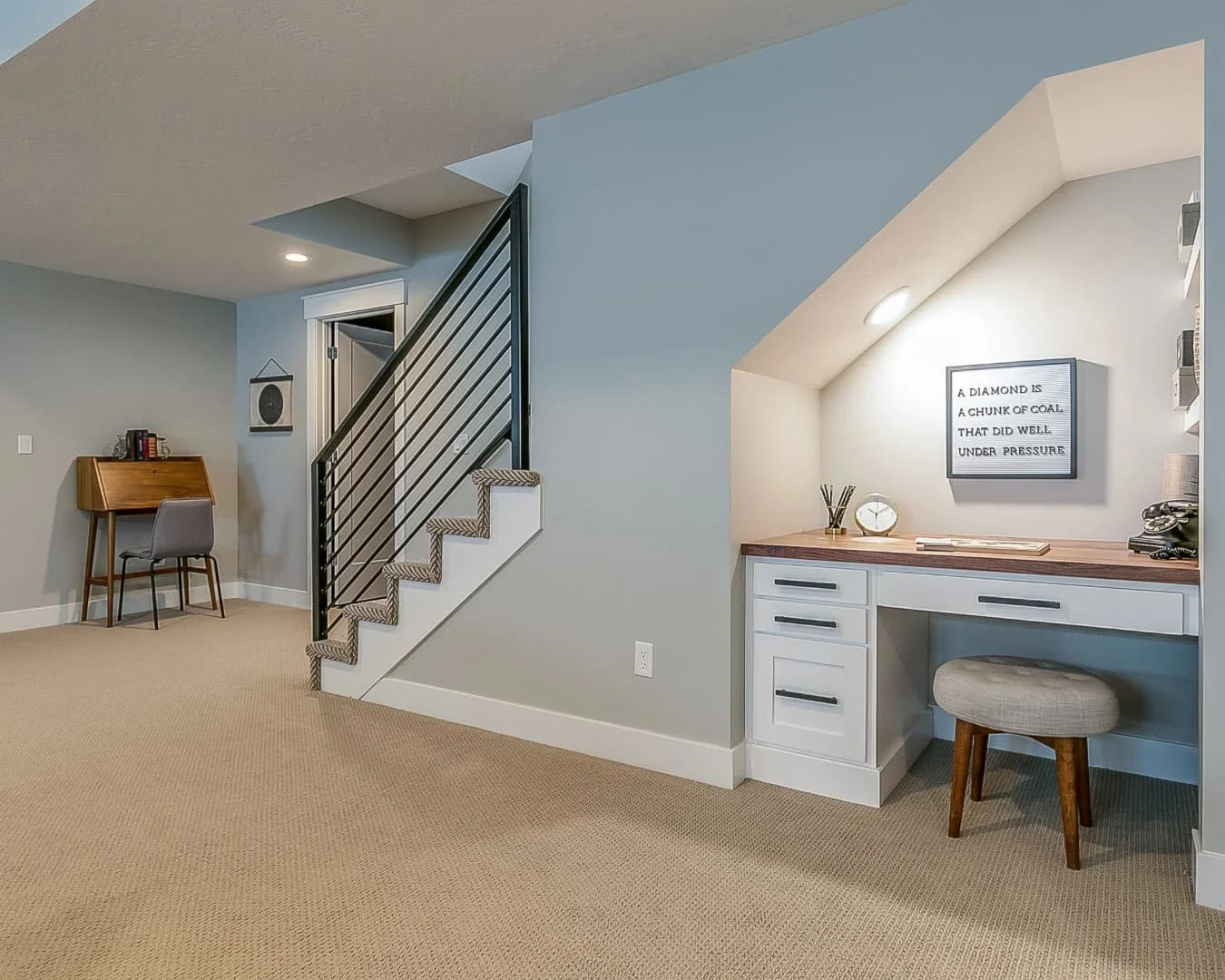 Bright basement remodel inspiration with stairs, open floor space, and a clean lower-level design.