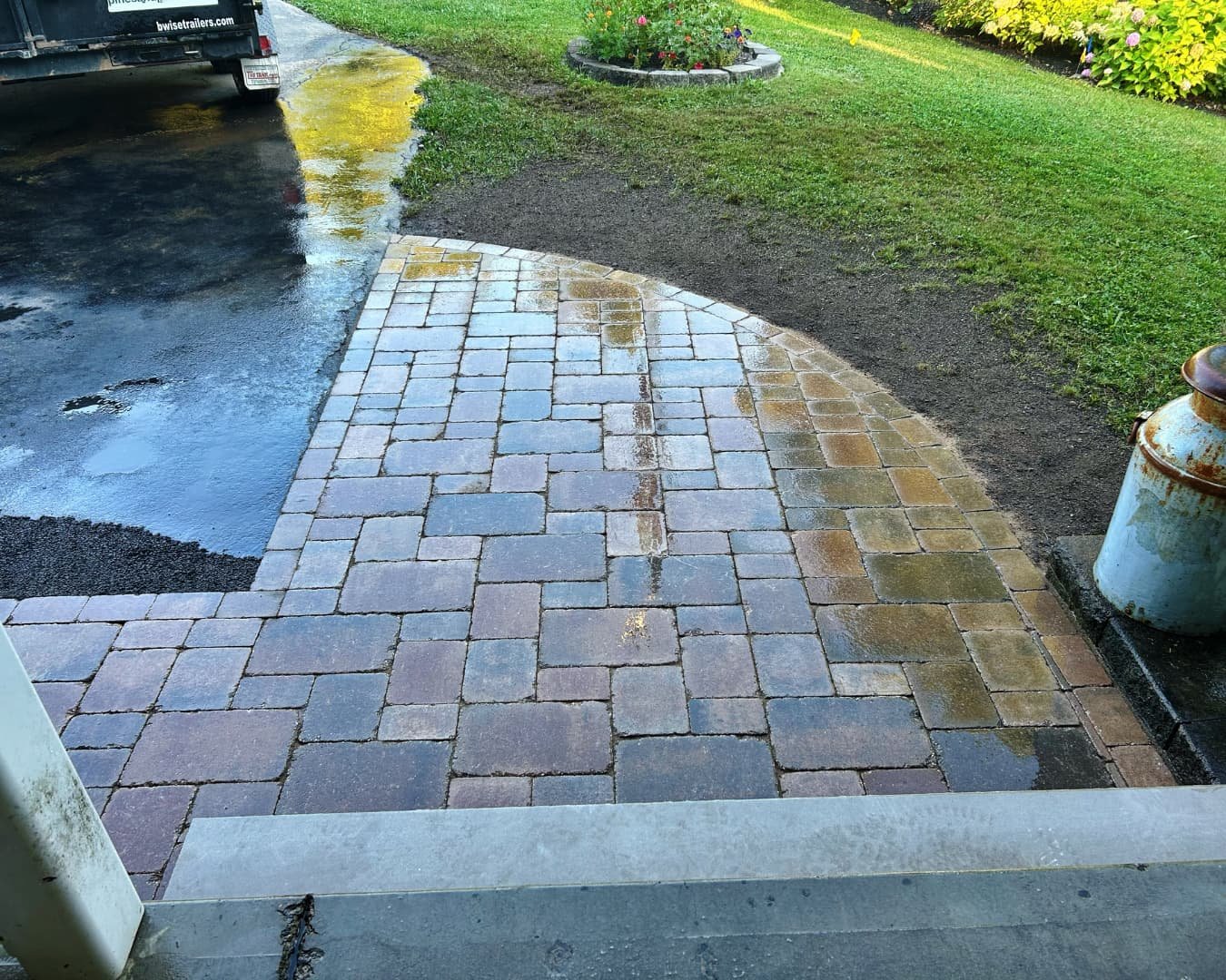 Paver walkway by the front steps completed by Pines and Pavers in Camillus, New York.