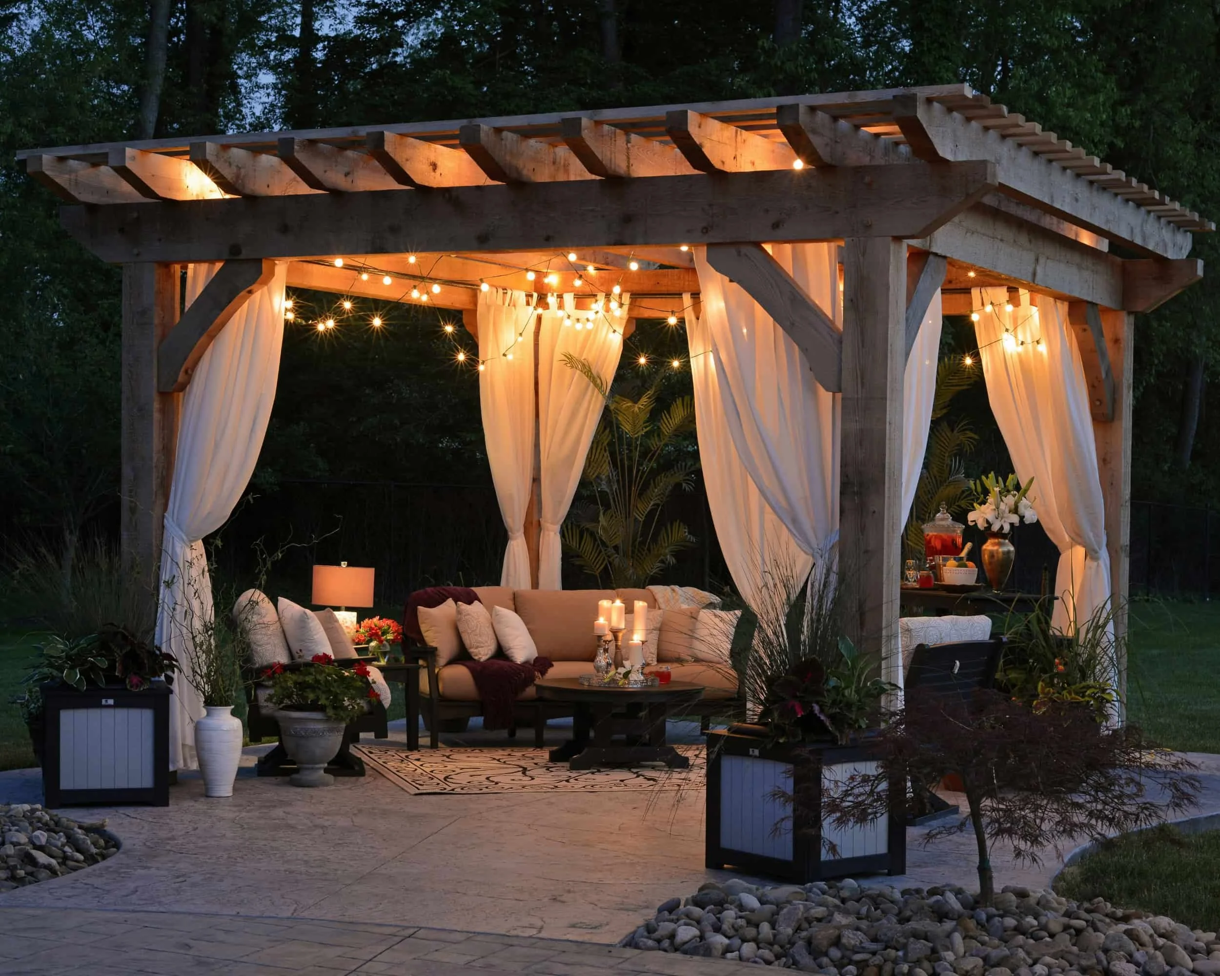 Backyard pergola installation designed for evening outdoor living