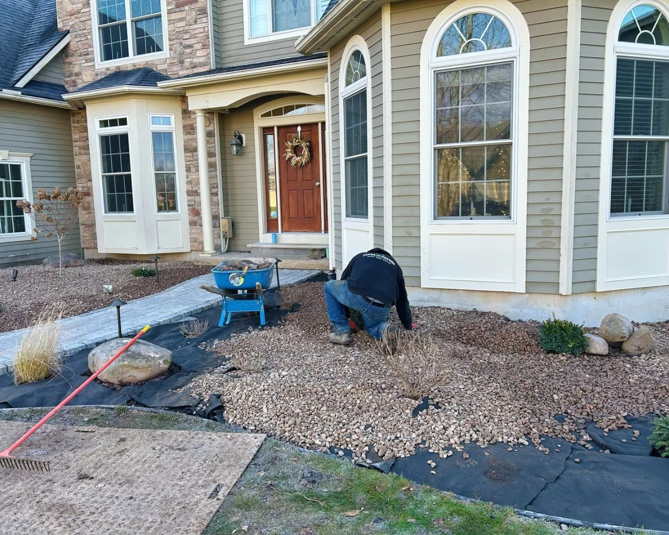 Front entry hardscape and bed preparation by Pines and Pavers in Fayetteville, New York.