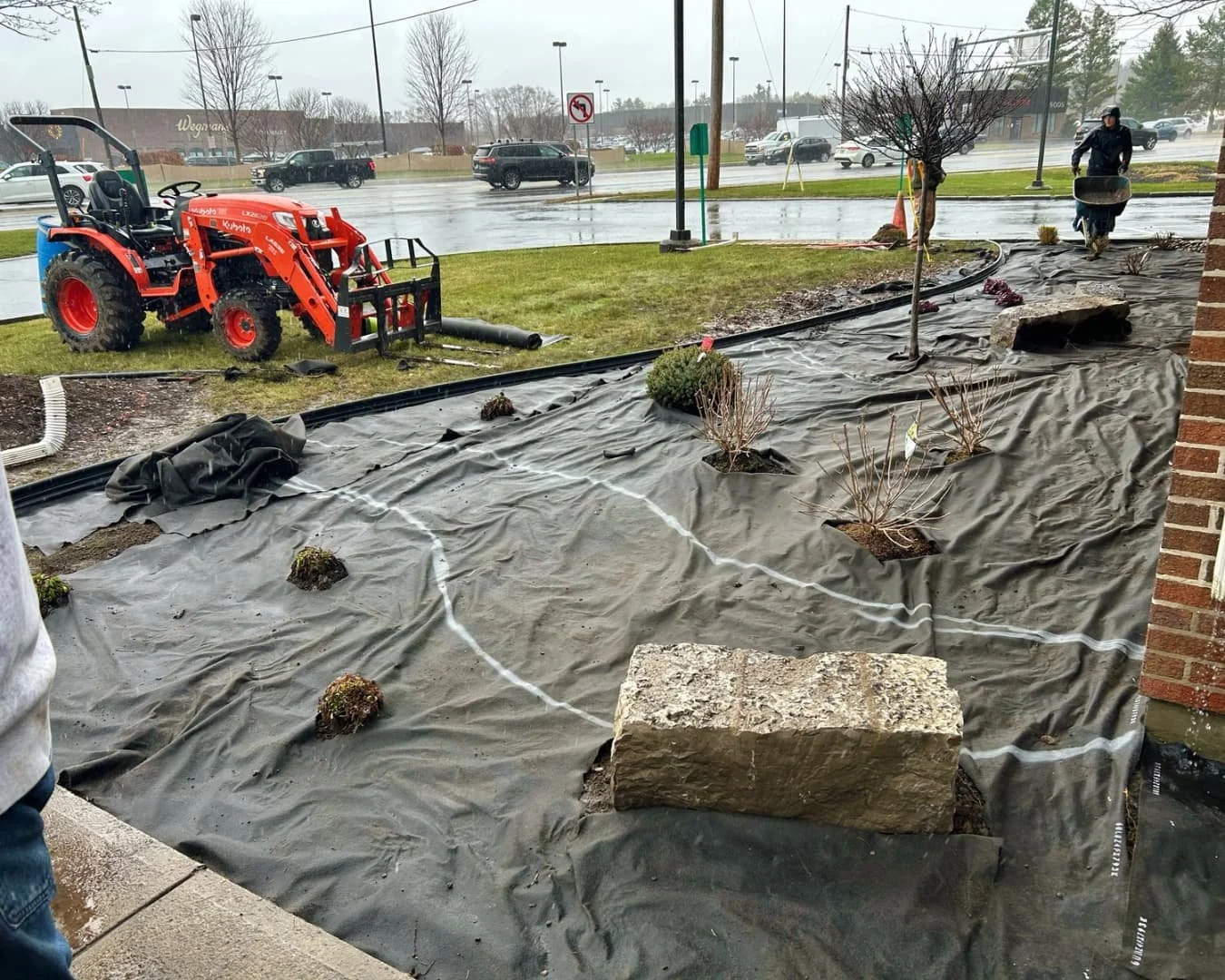Side foundation bed installation at Citizens Bank by Pines and Pavers in Cicero, New York.