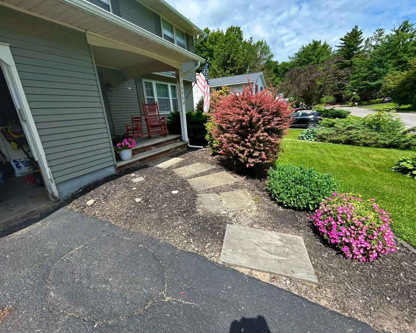 Front entry before the hardscape project by Pines and Pavers in Skaneateles, New York.