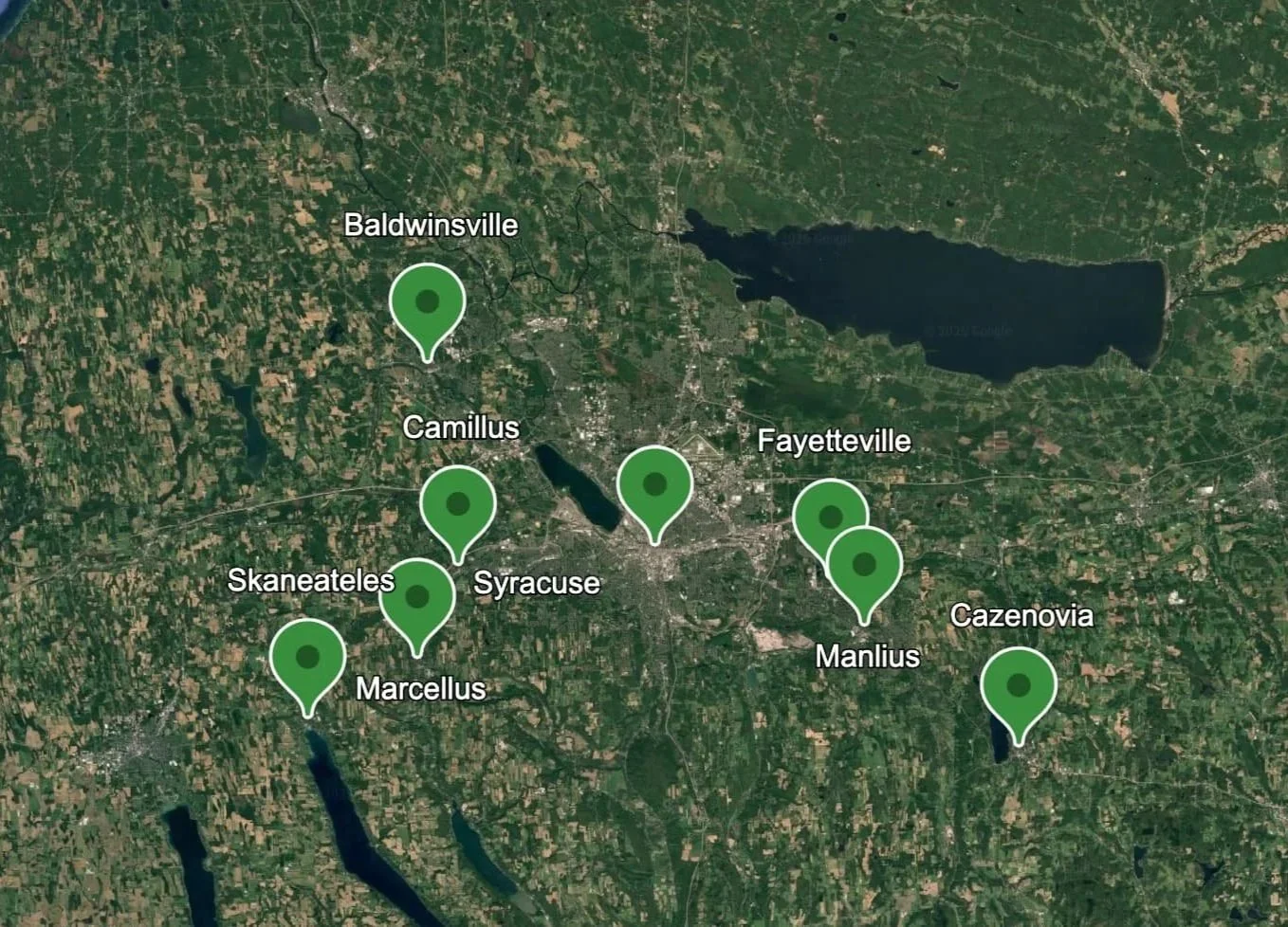 Map showing landscaping service locations across the Syracuse and Central New York area including Camillus, Skaneateles, Baldwinsville, Manlius, and Cazenovia.