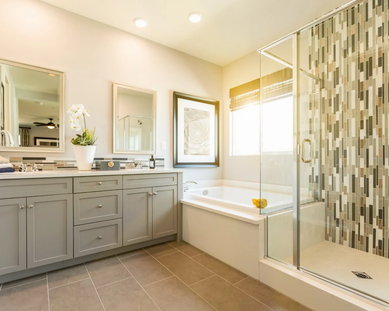 Modern bathroom inspiration with a freestanding tub, double vanity, and spacious shower layout.