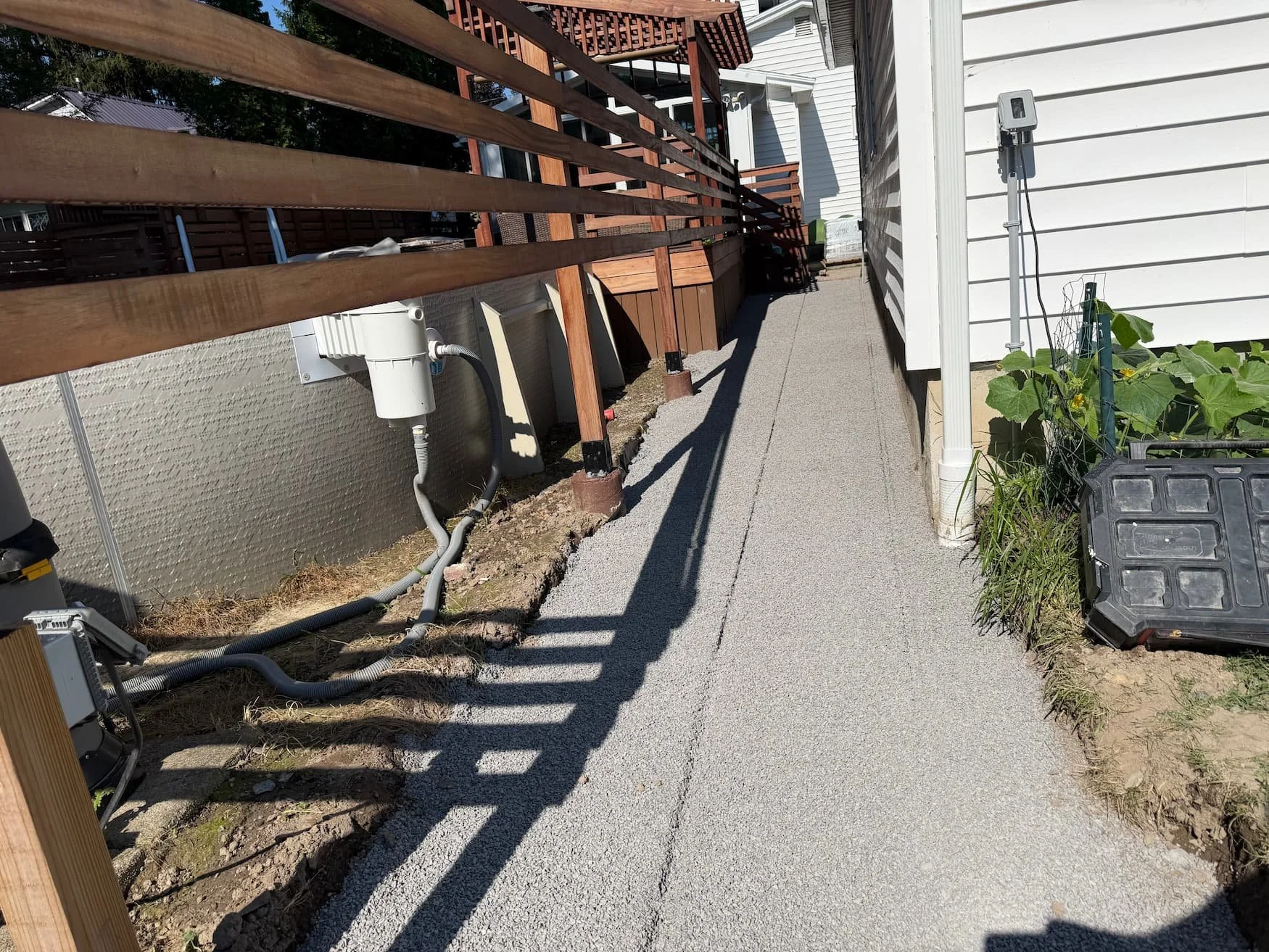 Newly installed paver patio during a backyard hardscape project in Central New York.