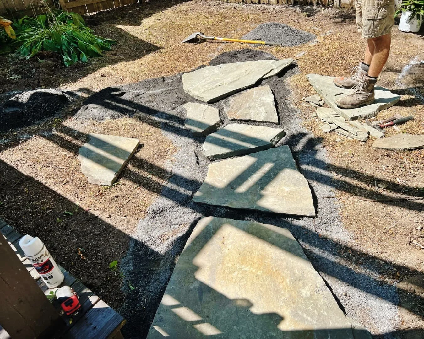 Stone steps and patio detail completed by Pines and Pavers in Baldwinsville, New York.