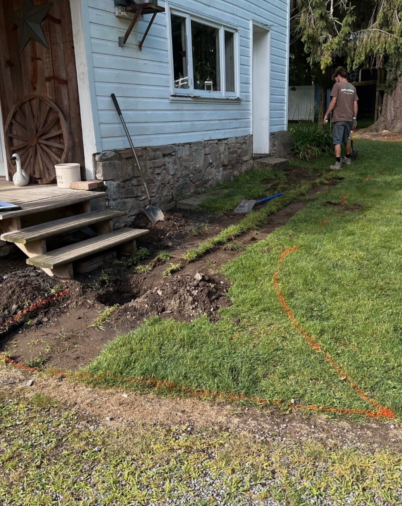 Front entry steps at an Upstate New York home with a clean stone finish and updated curb appeal.