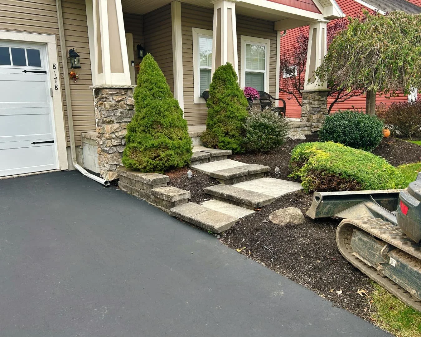 Front walkway and stone step entry completed by Pines and Pavers in Skaneateles Falls, New York.