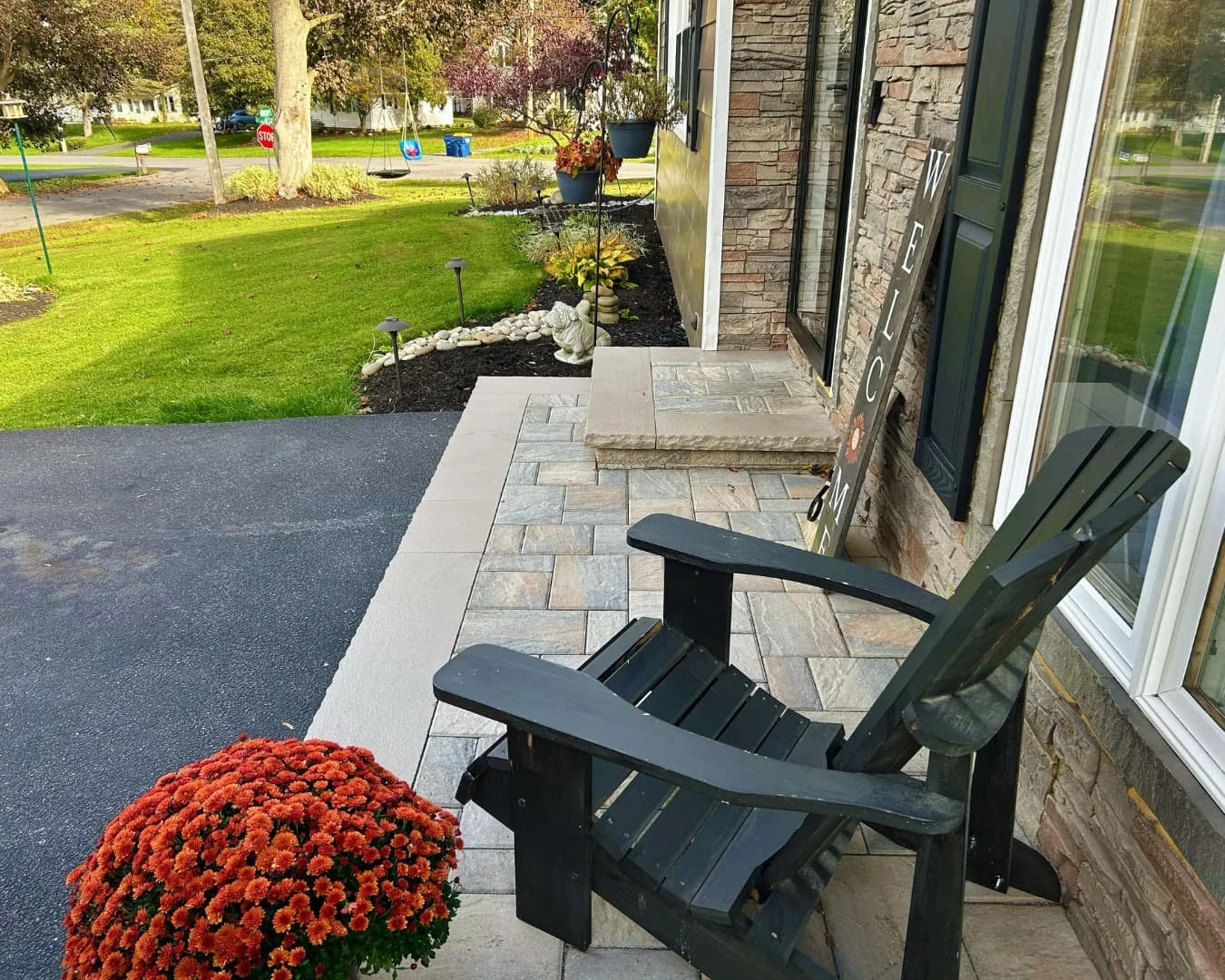 Front door paver patio overview completed by Pines and Pavers in Camillus, New York.