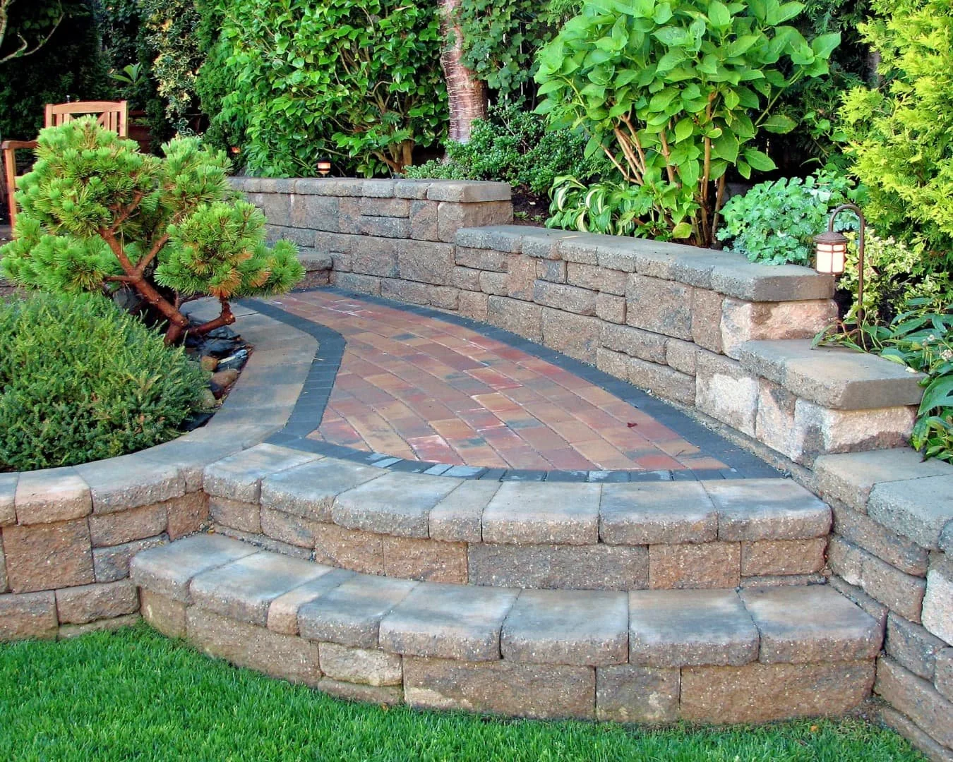 Stair inspiration with enclosed brick steps framed by walls and climbing greenery for a tucked-away garden feel.