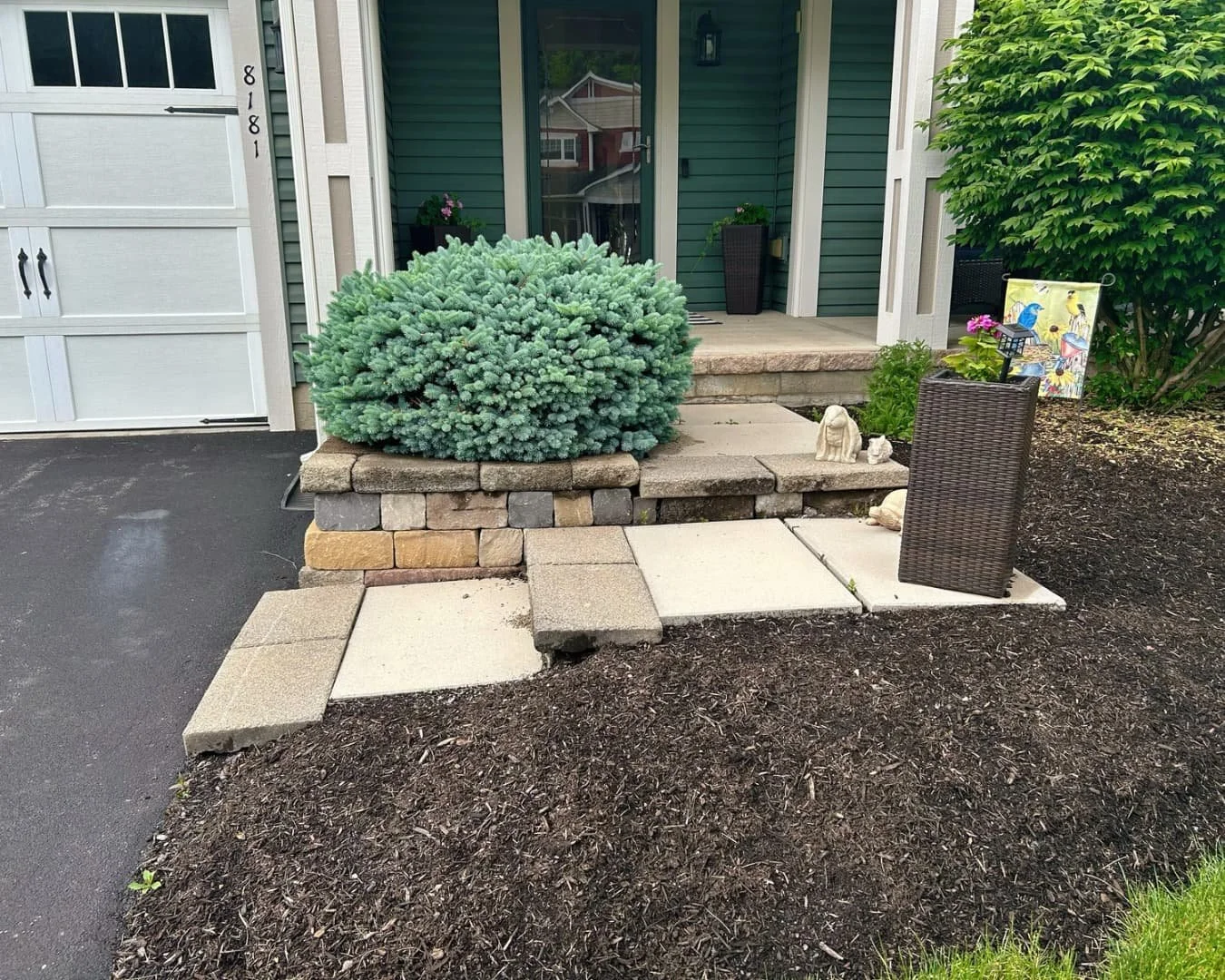 Existing front entry before the project by Pines and Pavers in Manlius, New York.